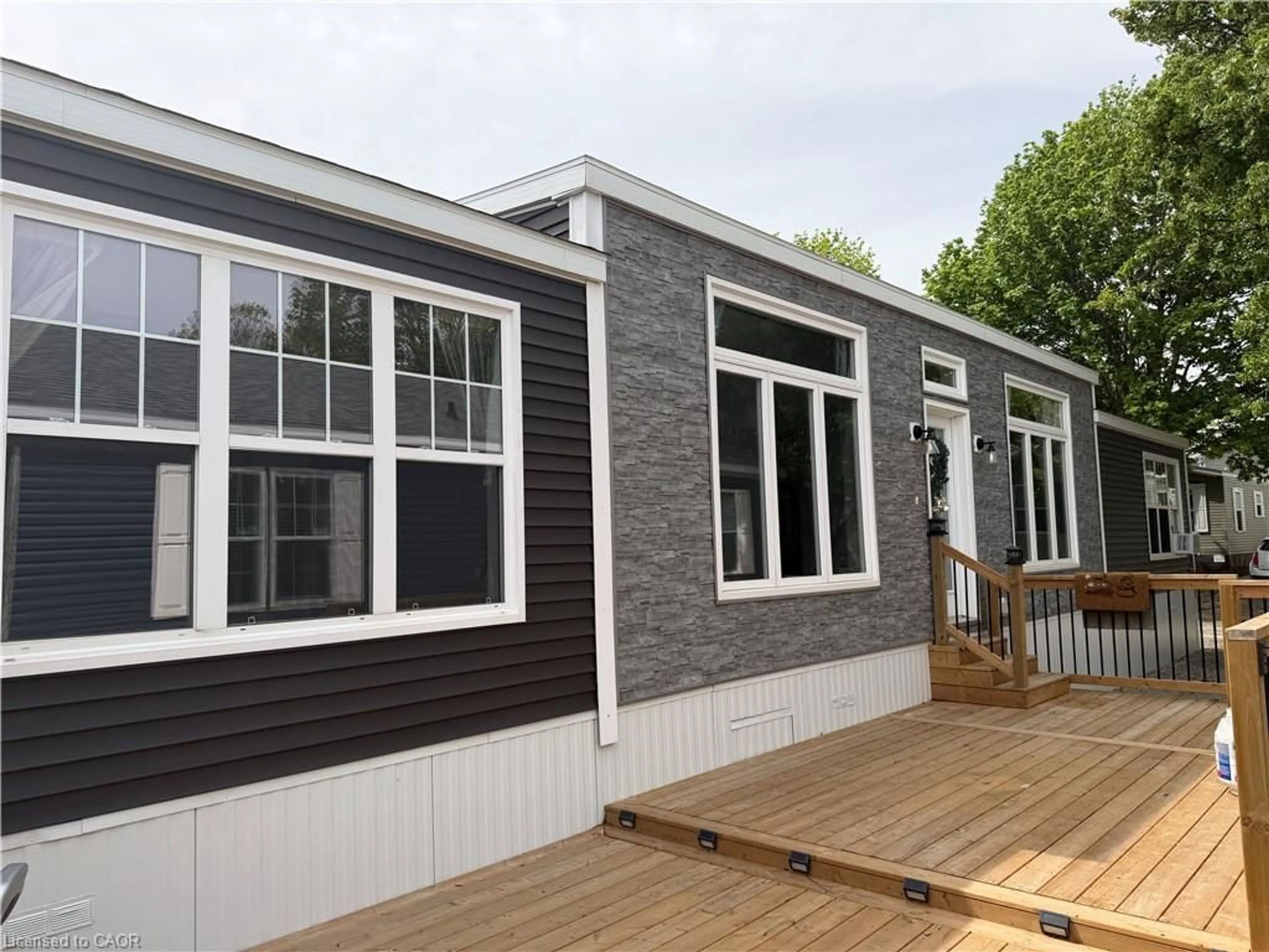 Home with vinyl exterior material, building for 99 Fourth Concession Rd #617, Burford Ontario N0E 1A0