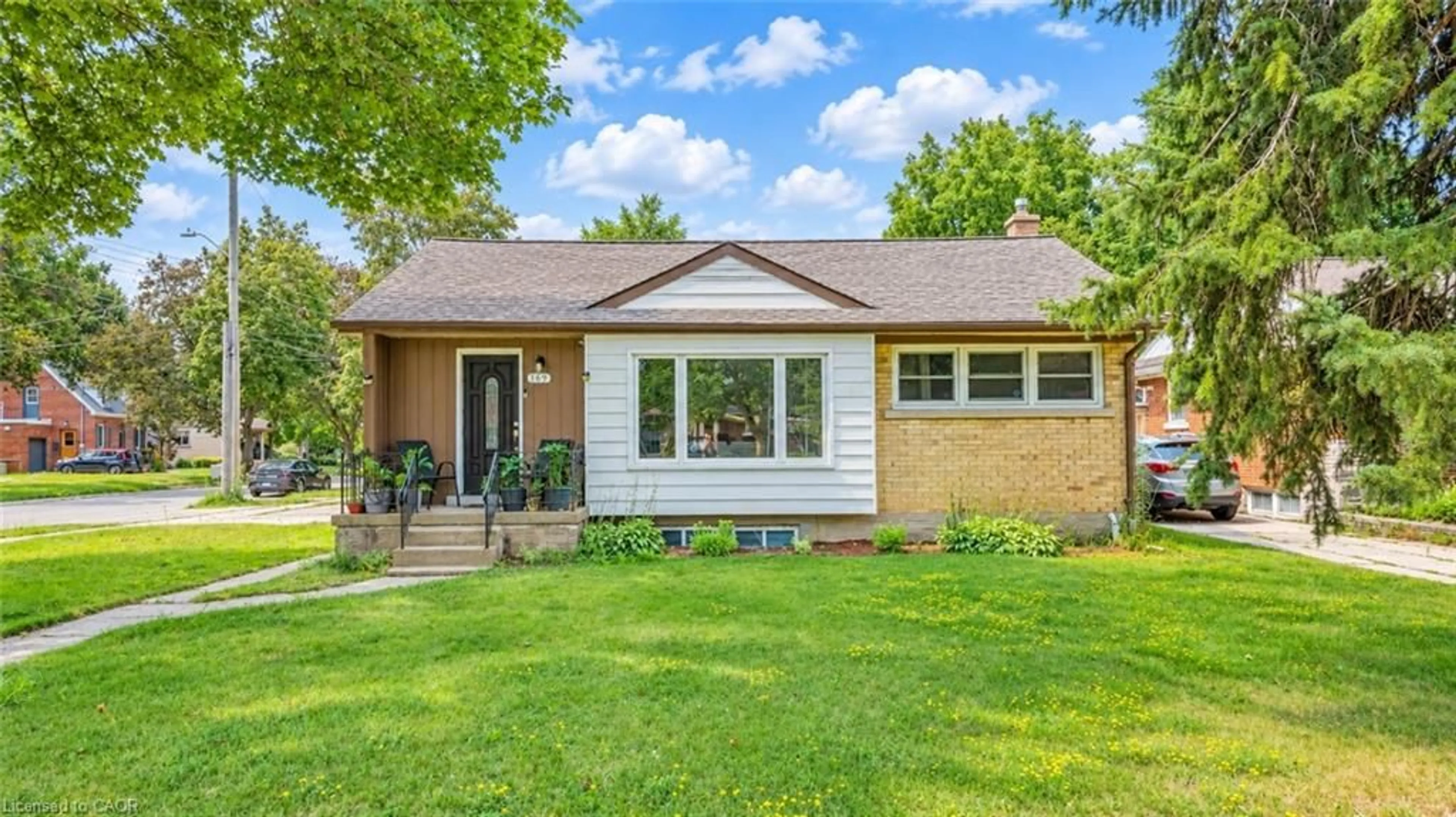 Home with brick exterior material, street for 169 Bruce St, Kitchener Ontario N2B 1Z2