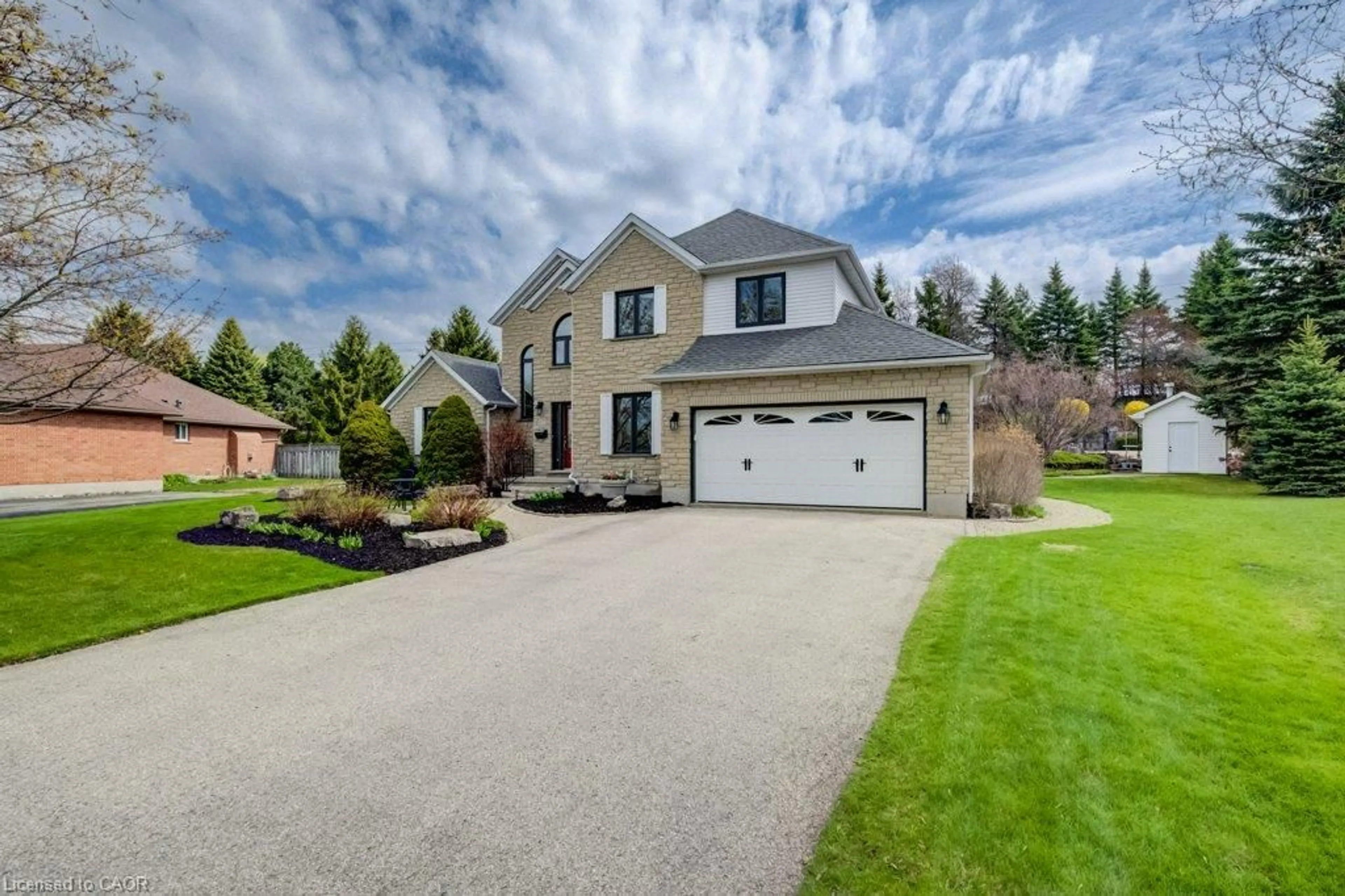 Home with vinyl exterior material, street for 207 Woodridge Dr, Mannheim Ontario N0B 2N0