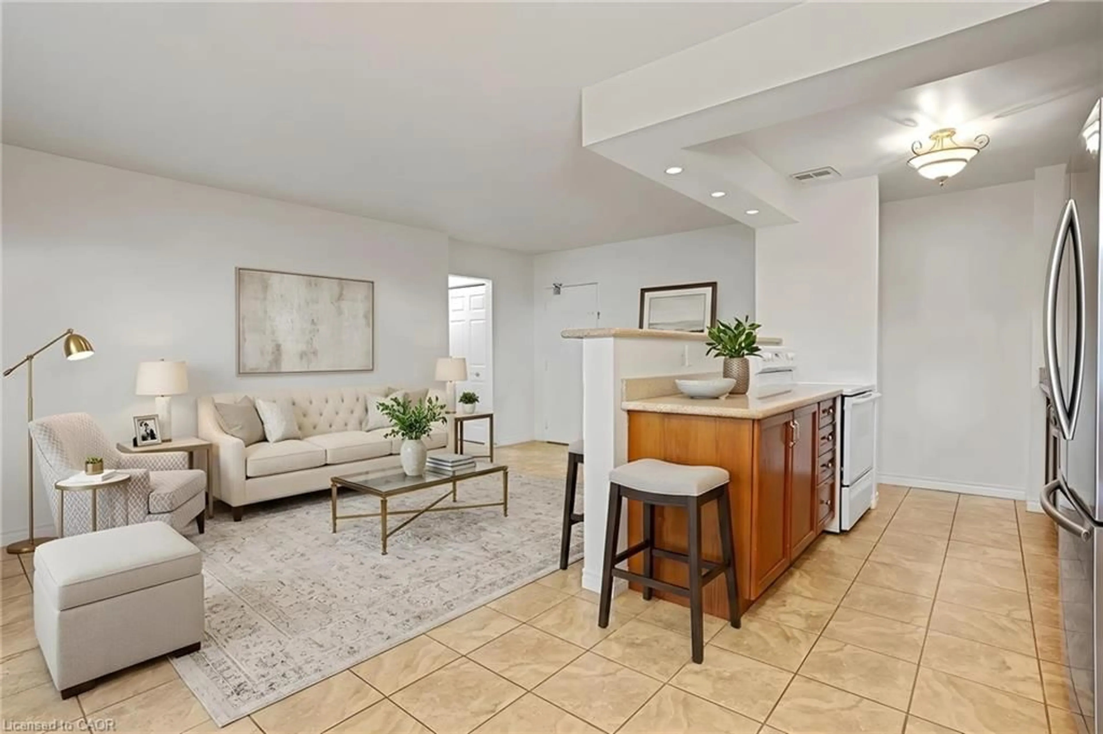 Living room with furniture, ceramic/tile floor for 793 Colborne St #114, Brantford Ontario N3S 7J3