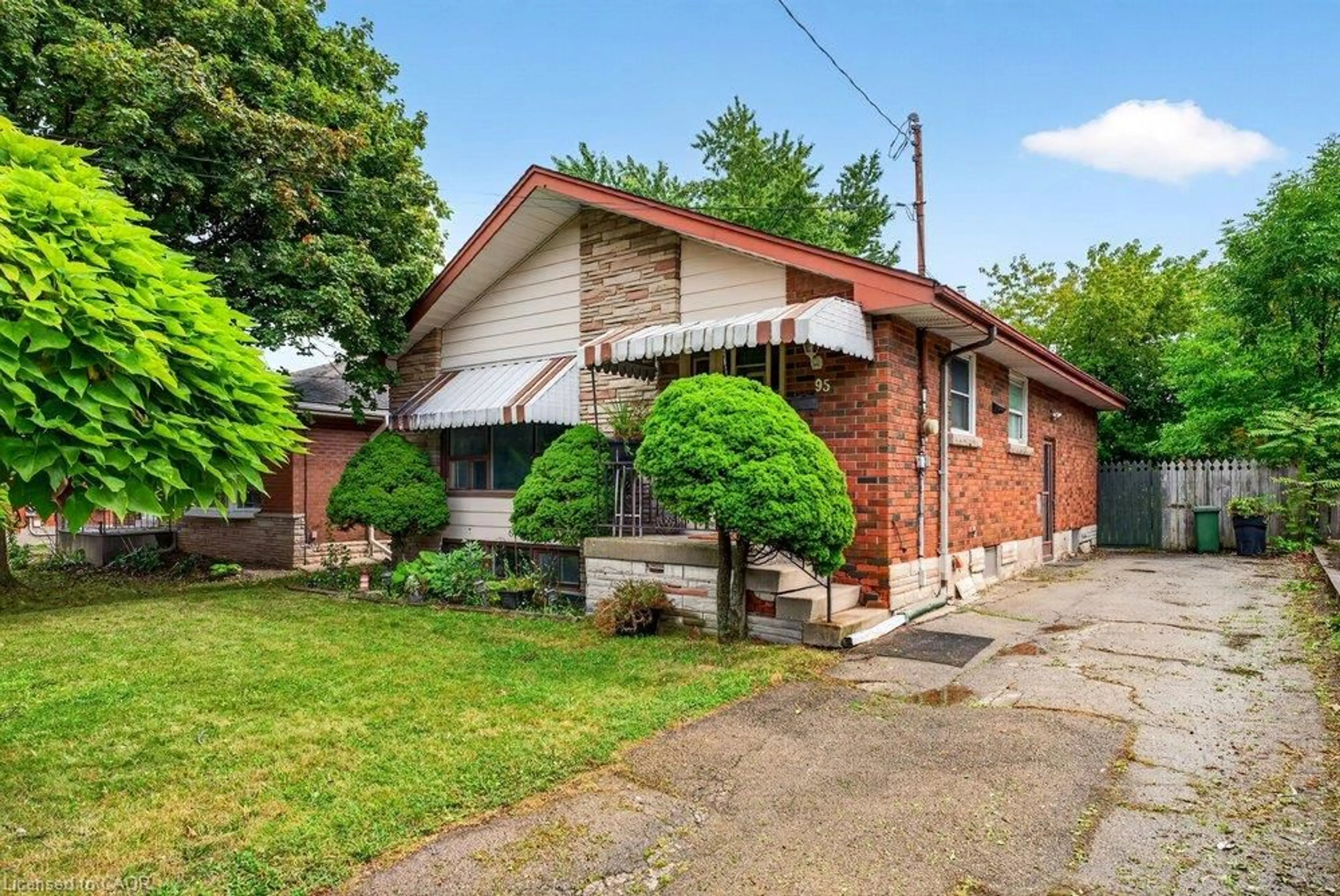 Home with brick exterior material, street for 95 West 4th St, Hamilton Ontario L9C 3M8