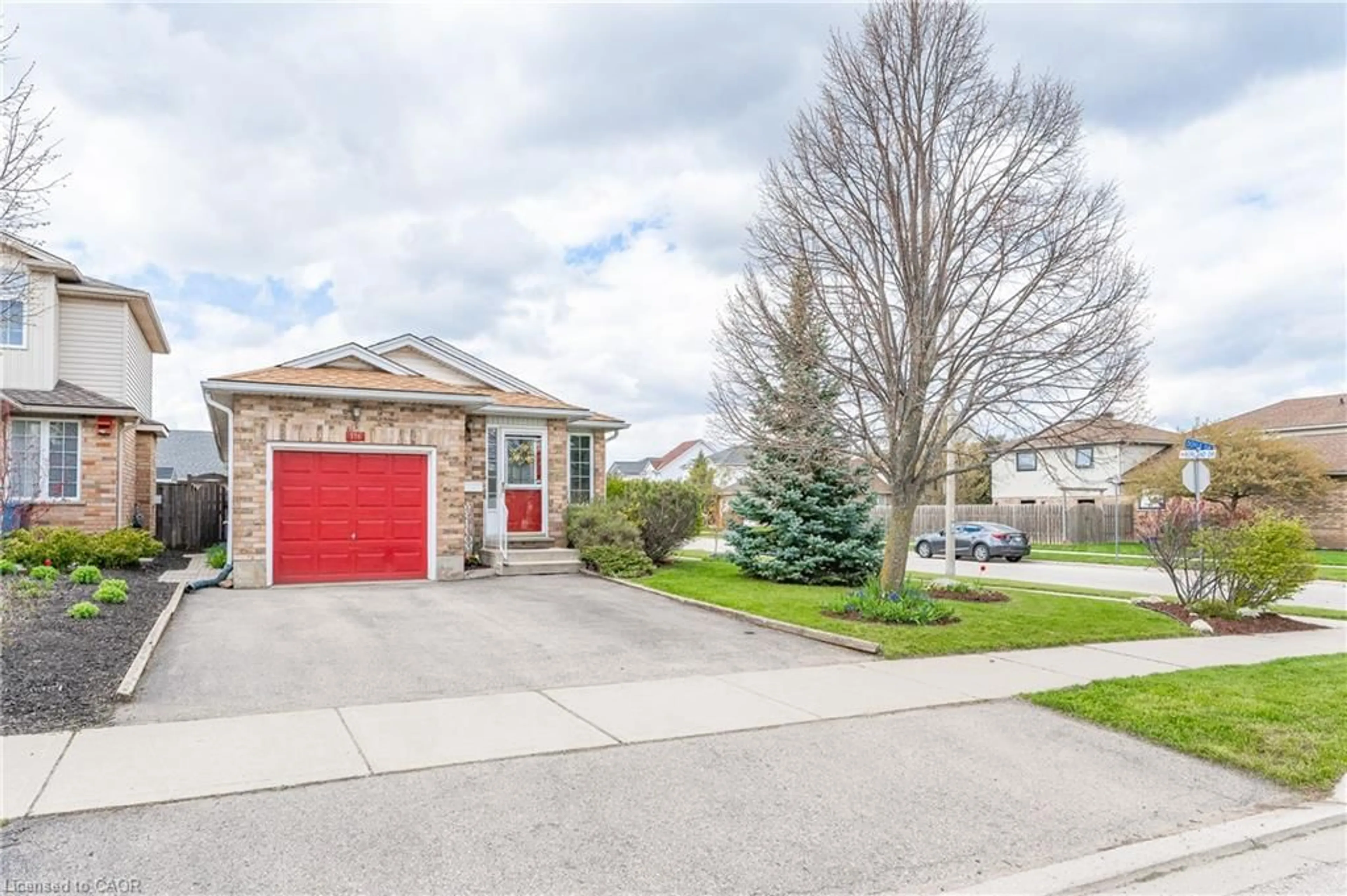 Home with brick exterior material, street for 116 Doyle Dr, Guelph Ontario N1G 5B4