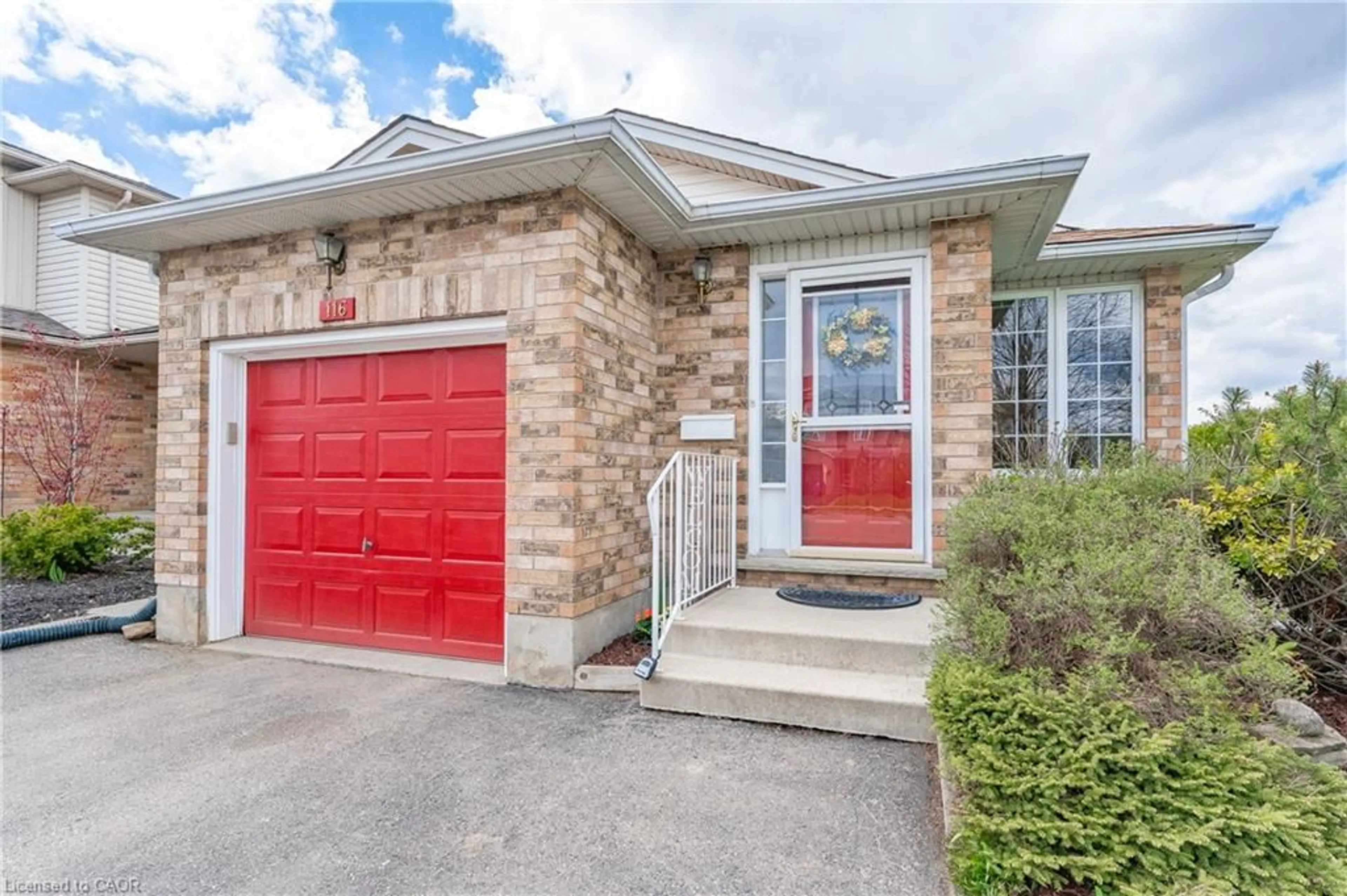 Home with brick exterior material, street for 116 Doyle Dr, Guelph Ontario N1G 5B4