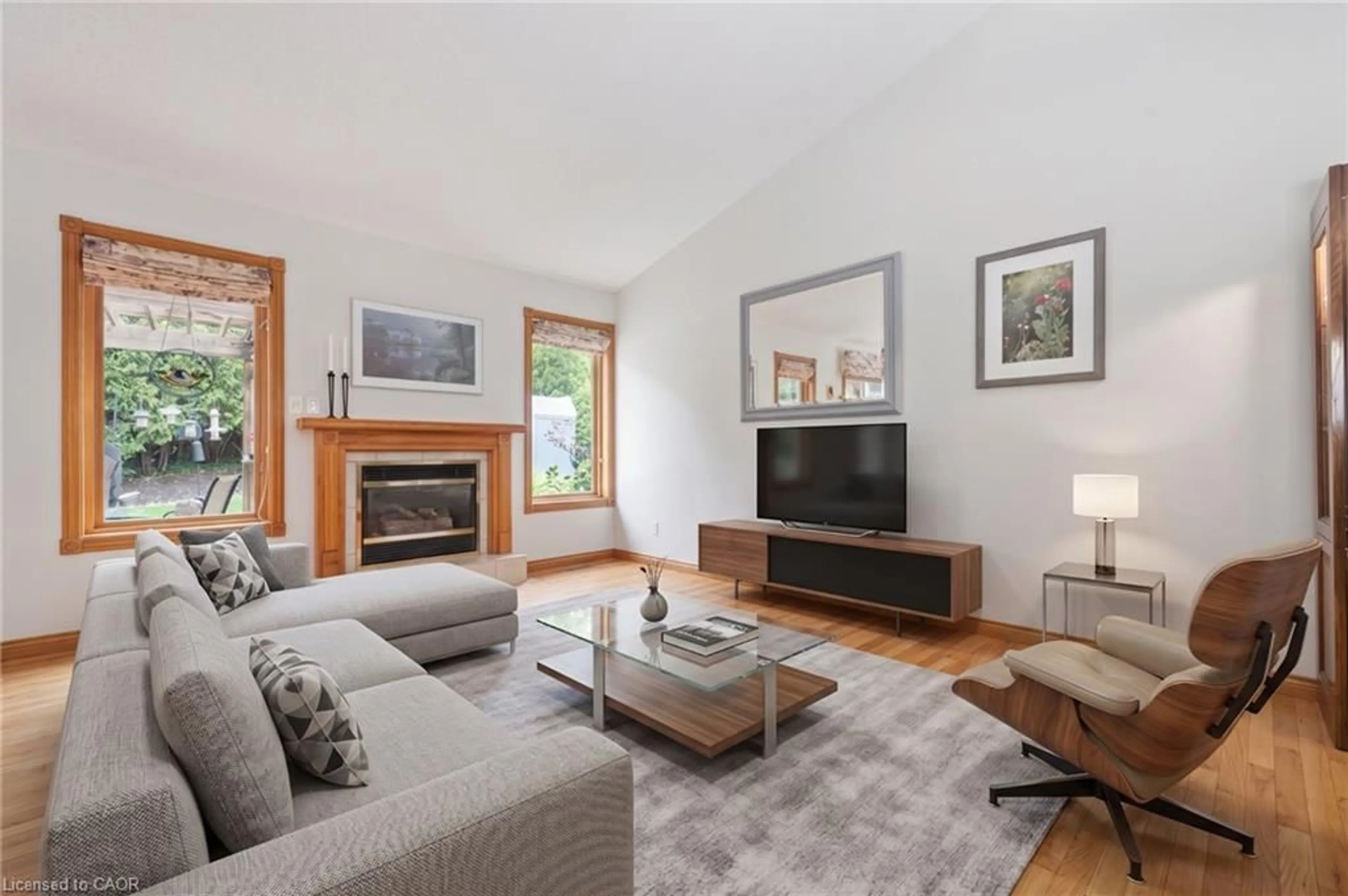 Living room with furniture, wood/laminate floor for 11 Keating Dr, Centre Wellington Ontario N0B 1S0
