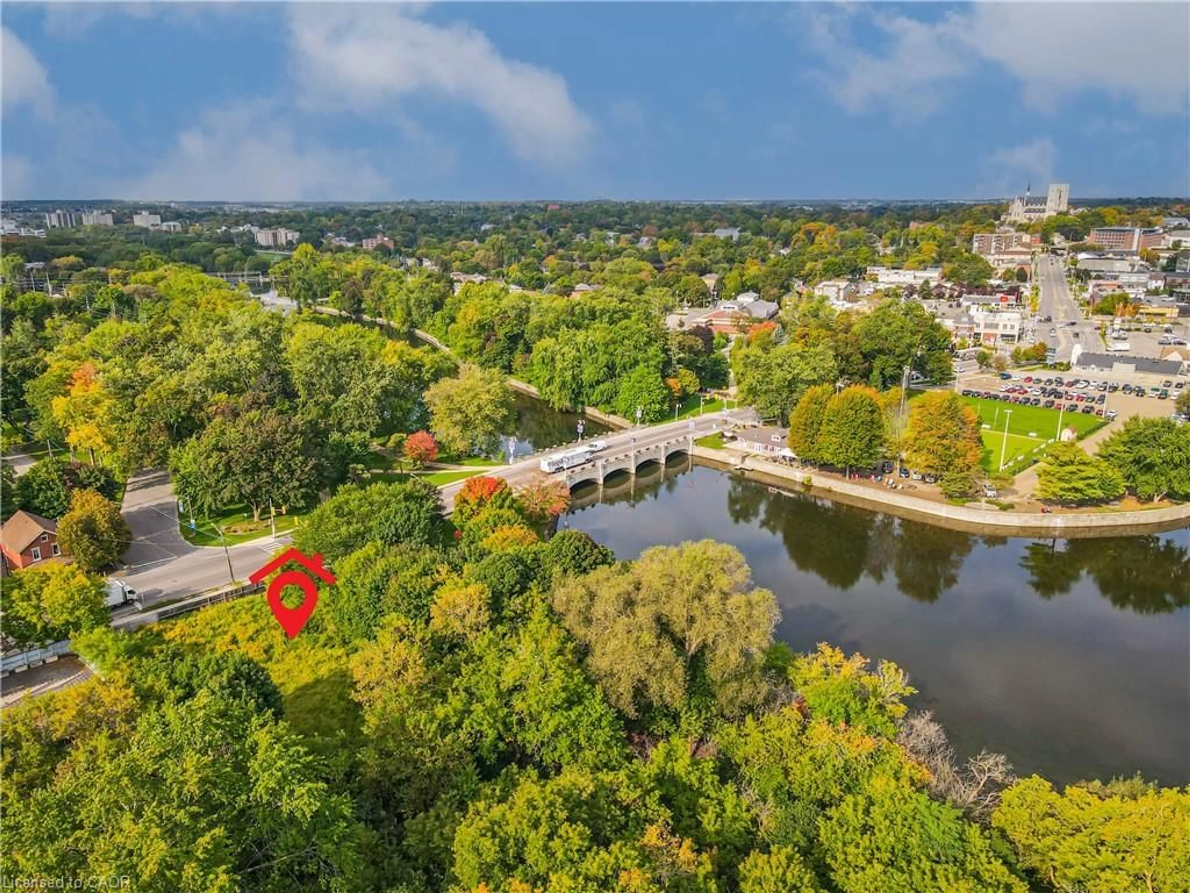 A pic from outside/outdoor area/front of a property/back of a property/a pic from drone, water/lake/river/ocean view for 180 Gordon St #7, Guelph Ontario N1G 1X1