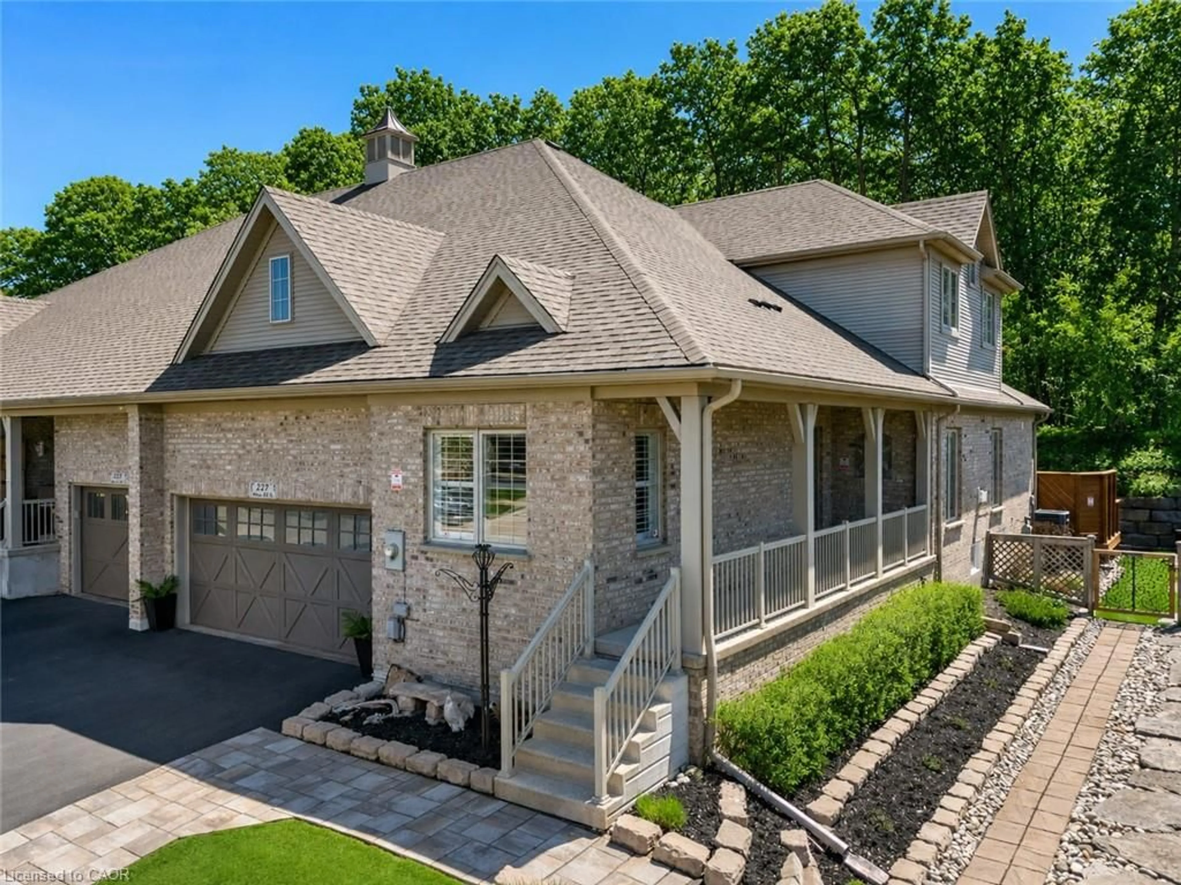 Home with brick exterior material, street for 227 Chestnut Hill Cres, Kitchener Ontario N2P 2X3