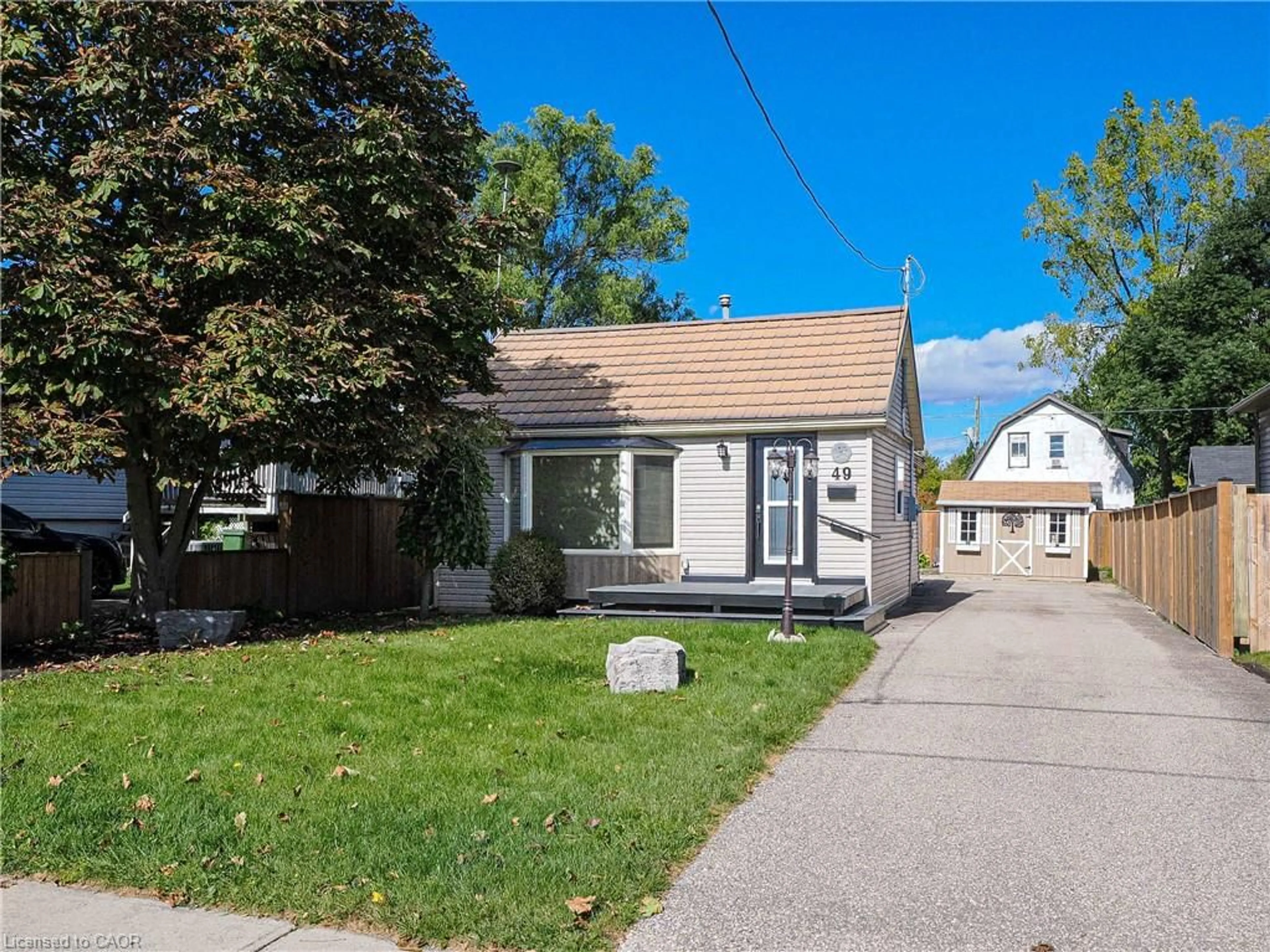 Home with vinyl exterior material, street for 49 Brown St, Port Dover Ontario N0A 1N7