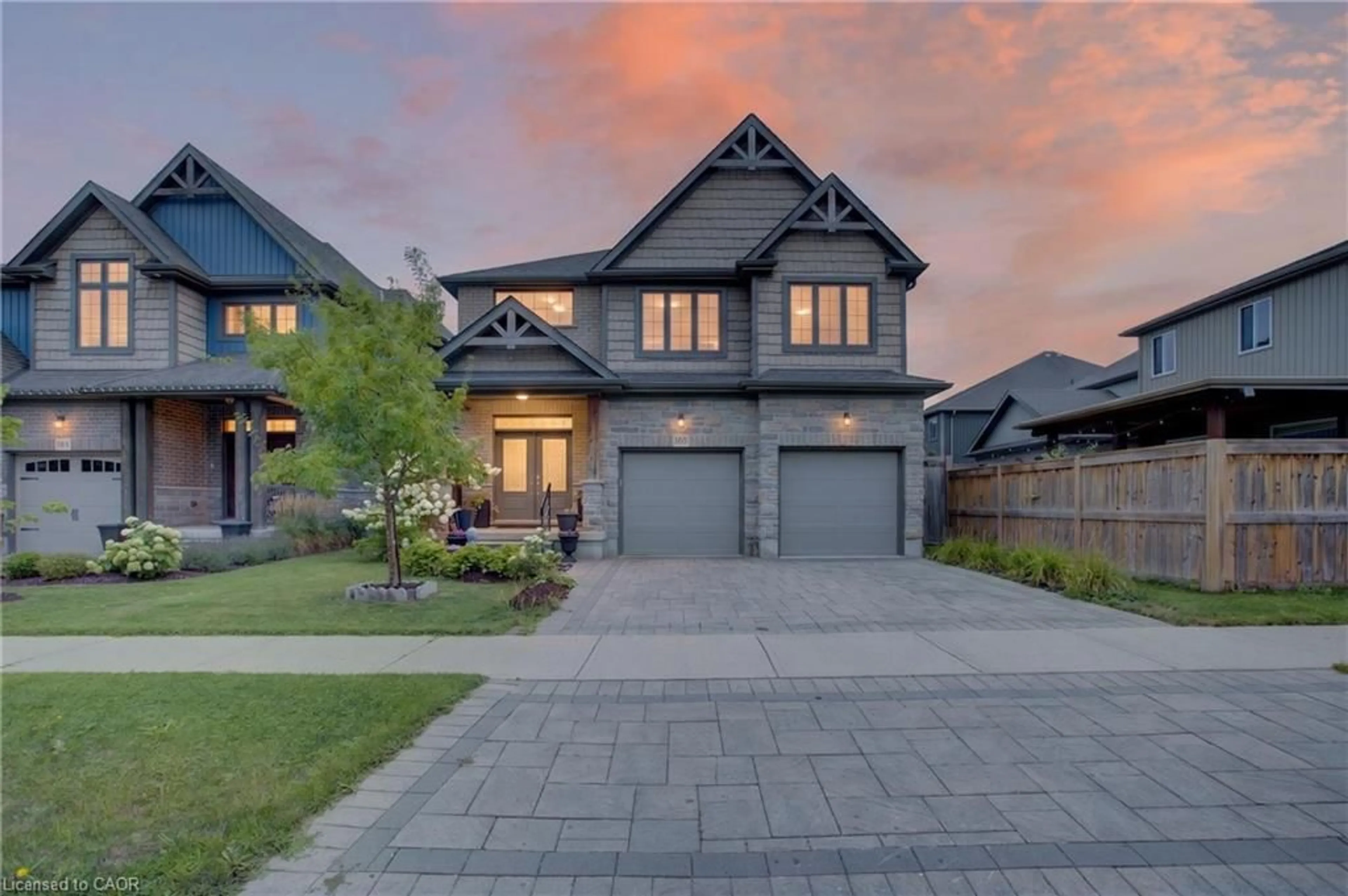 Home with brick exterior material, street for 165 Eaglecrest St, Kitchener Ontario N2K 0C5