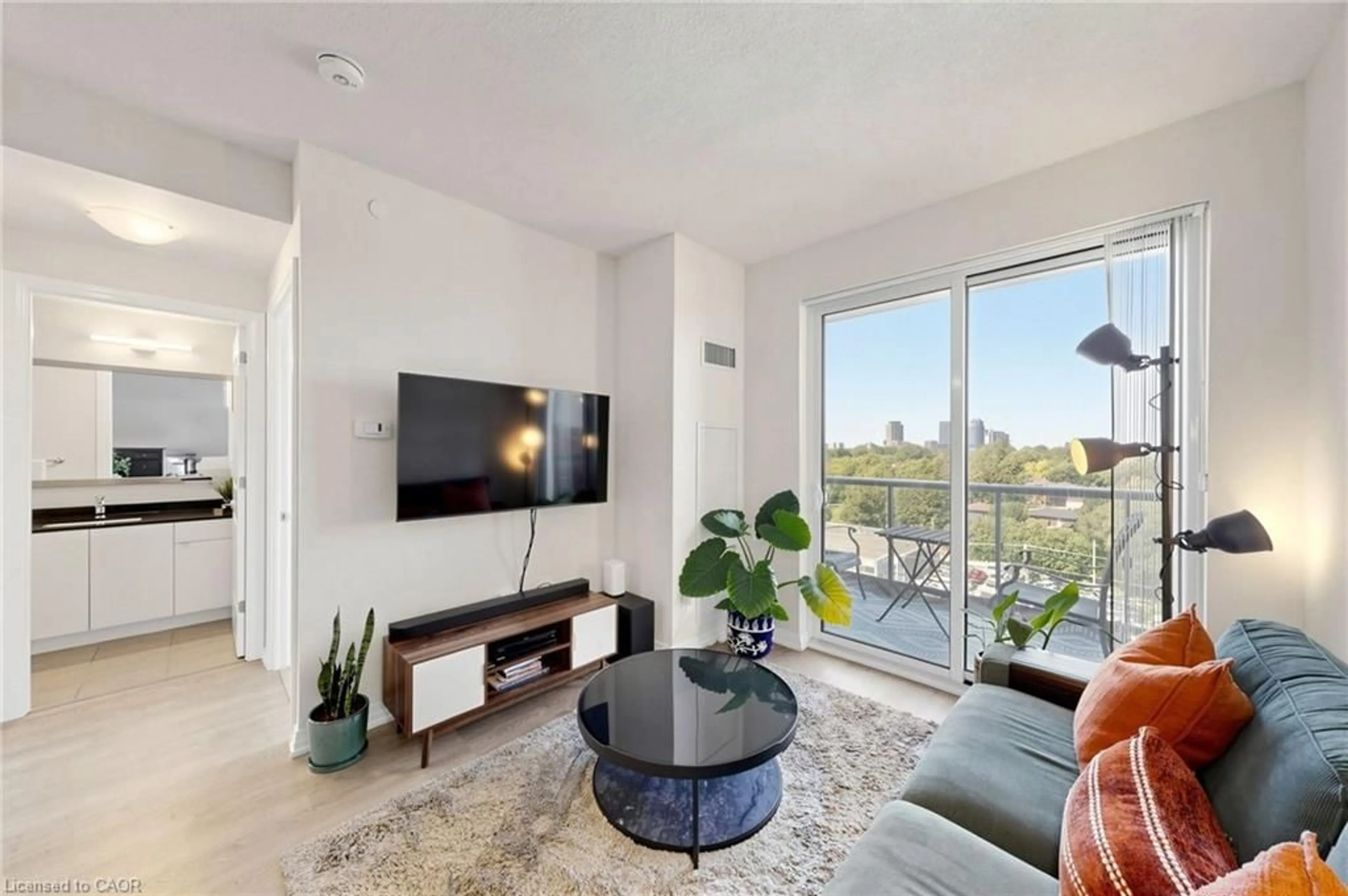 Living room with furniture, unknown for 50 Thomas Riley Rd #712, Etobicoke Ontario M9B 0C5