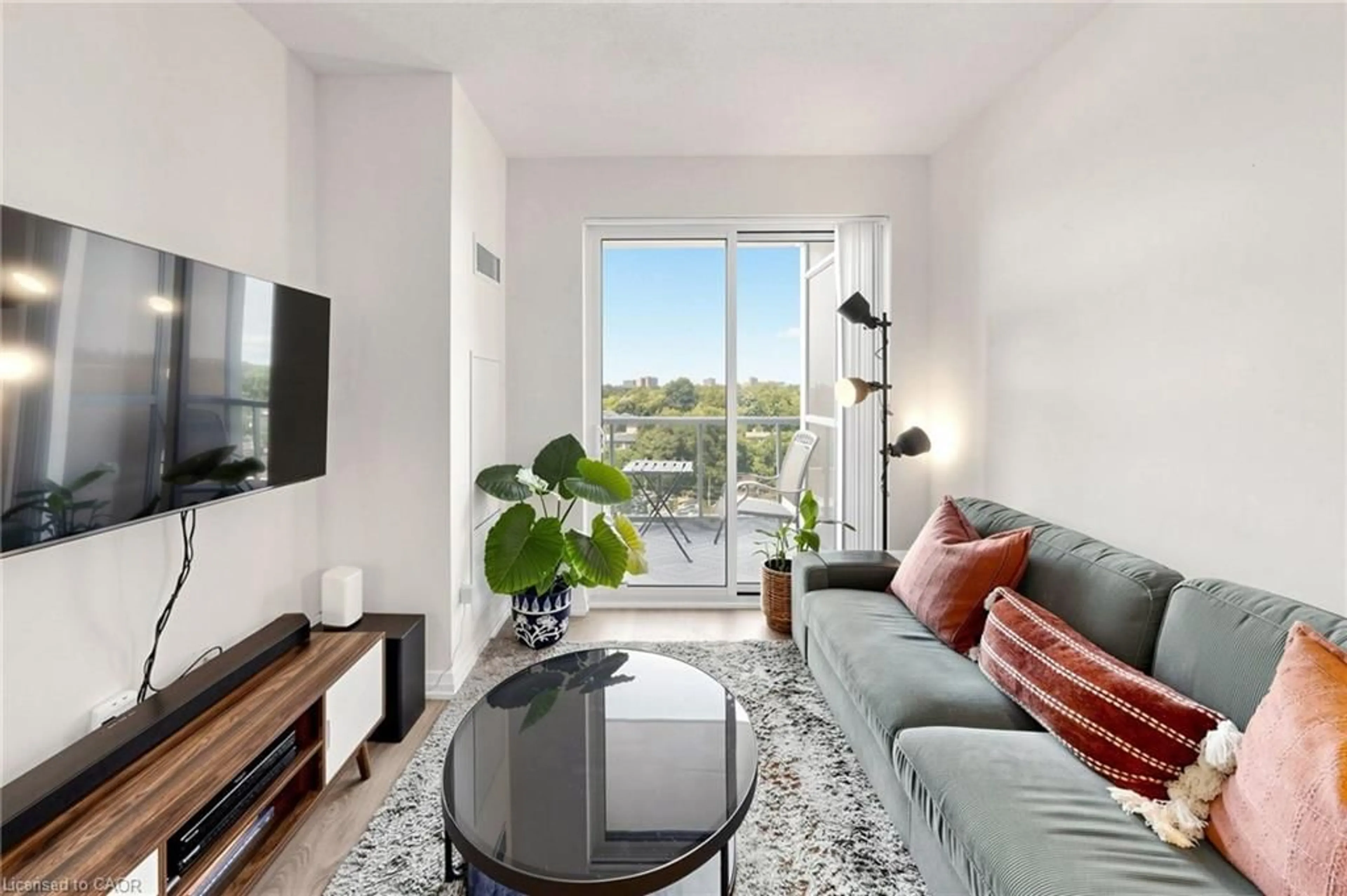 Living room with furniture, unknown for 50 Thomas Riley Rd #712, Etobicoke Ontario M9B 0C5
