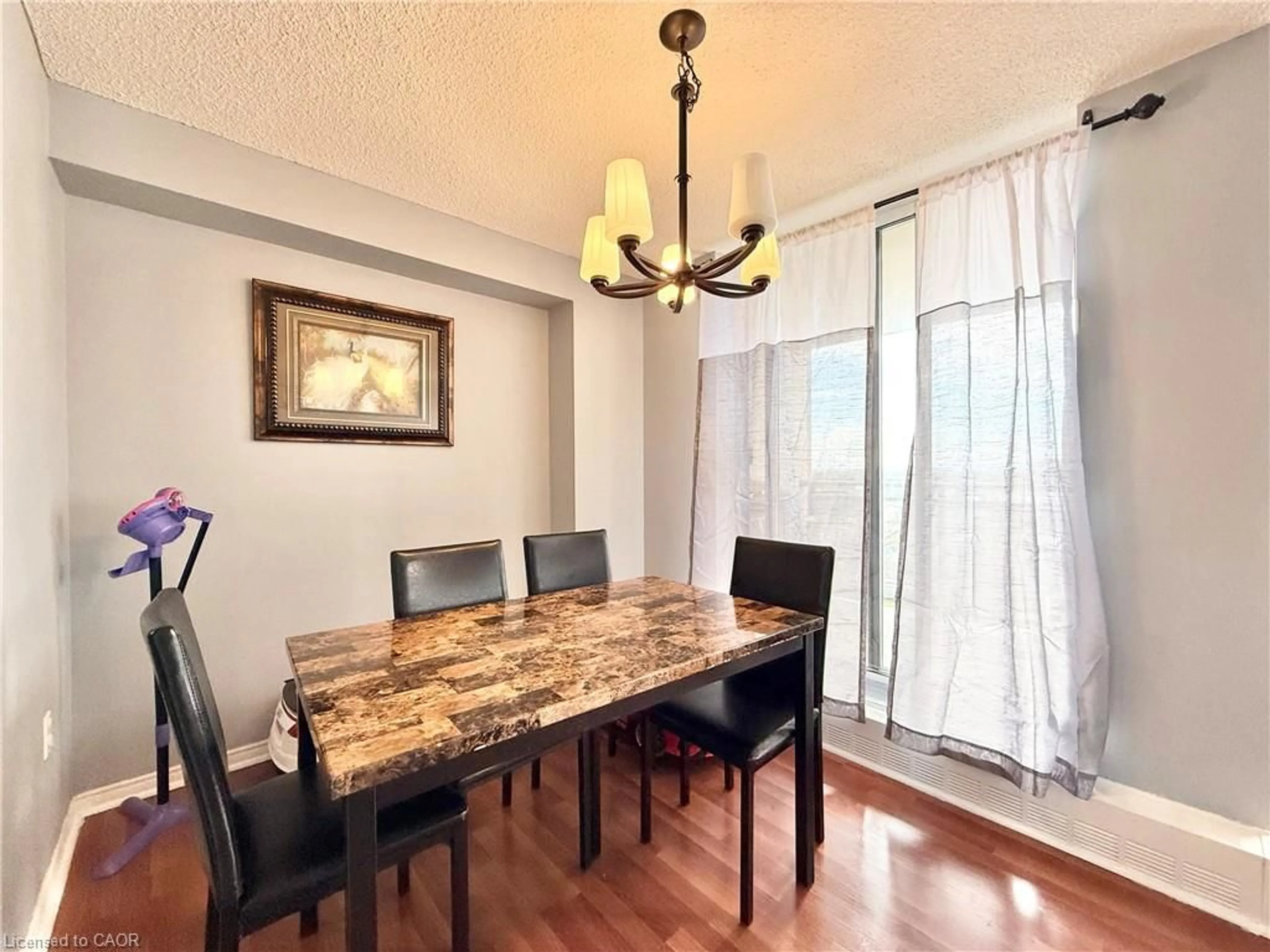 Dining room, wood/laminate floor for 2900 Battleford Rd #1013, Mississauga Ontario L5N 2V9