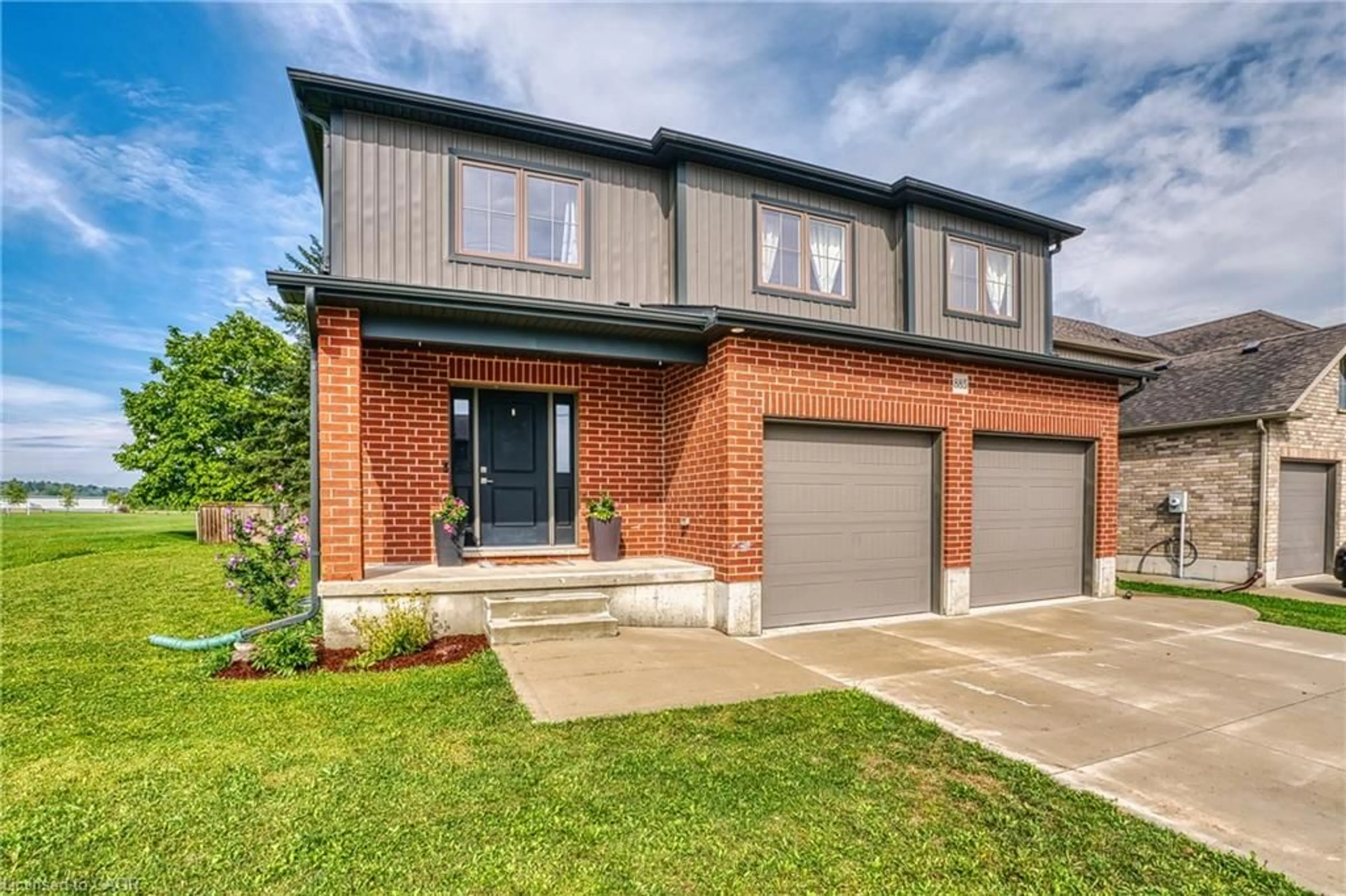 Home with brick exterior material, street for 885 Binning St, Listowel Ontario N4W 0J7