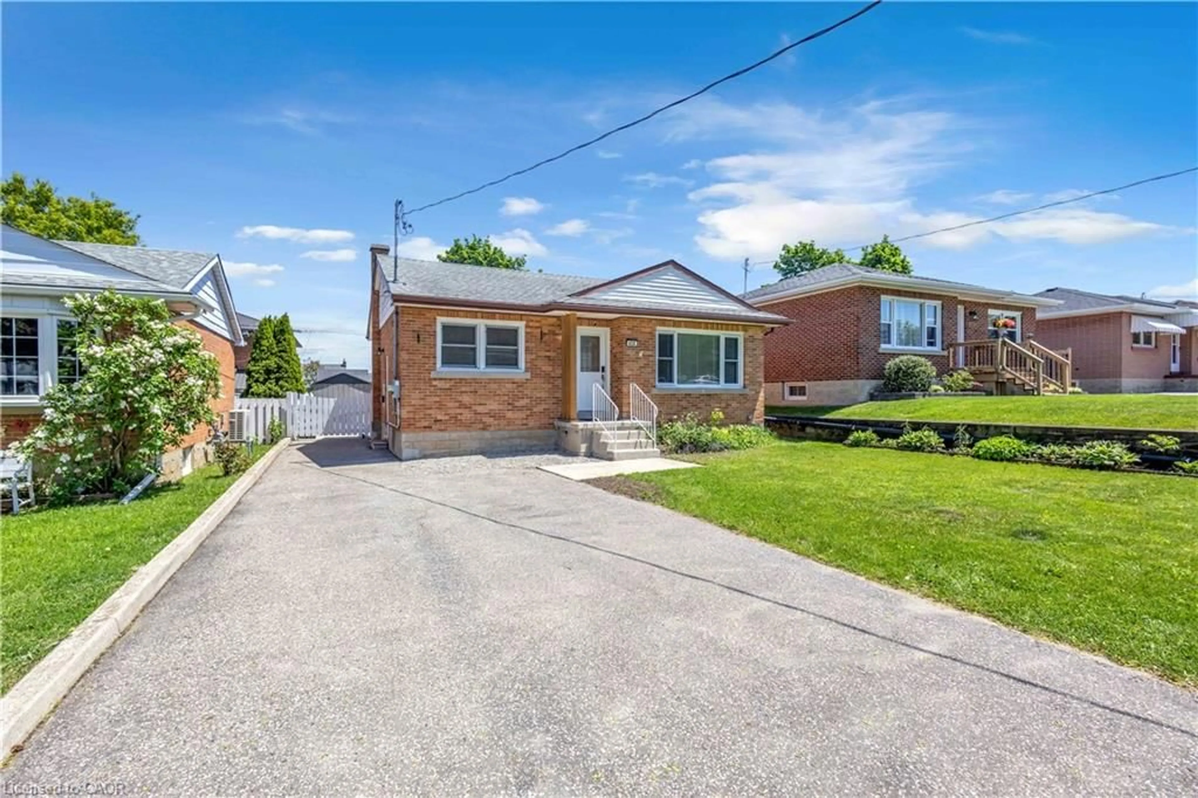 Home with brick exterior material, street for 450 Highland Rd, Kitchener Ontario N2M 3W7
