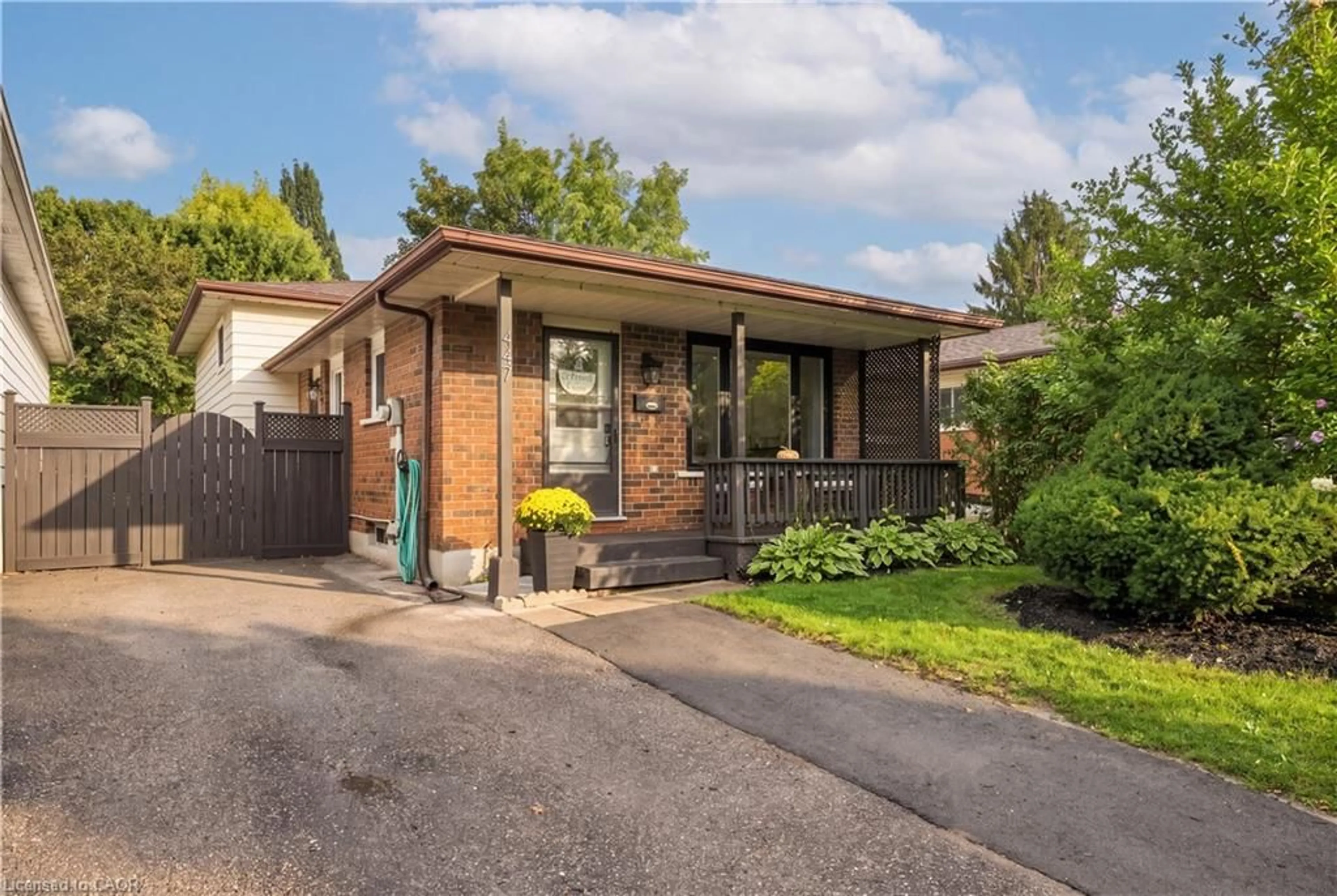 Home with brick exterior material, street for 447 Drummerhill Cres, Waterloo Ontario N2T 1G3