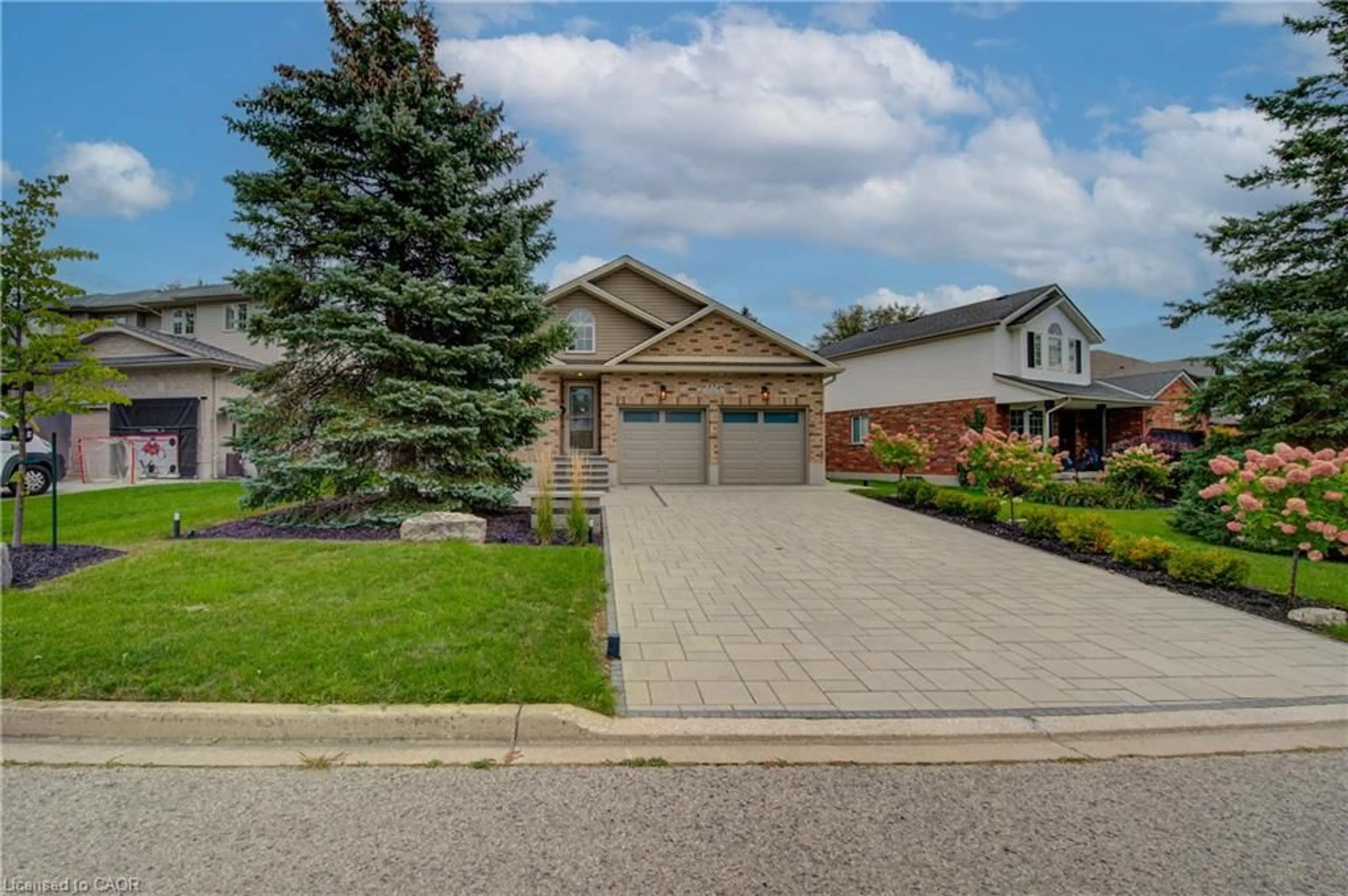 Home with brick exterior material, street for 574 Clipper Dr, Waterloo Ontario N2K 4B4