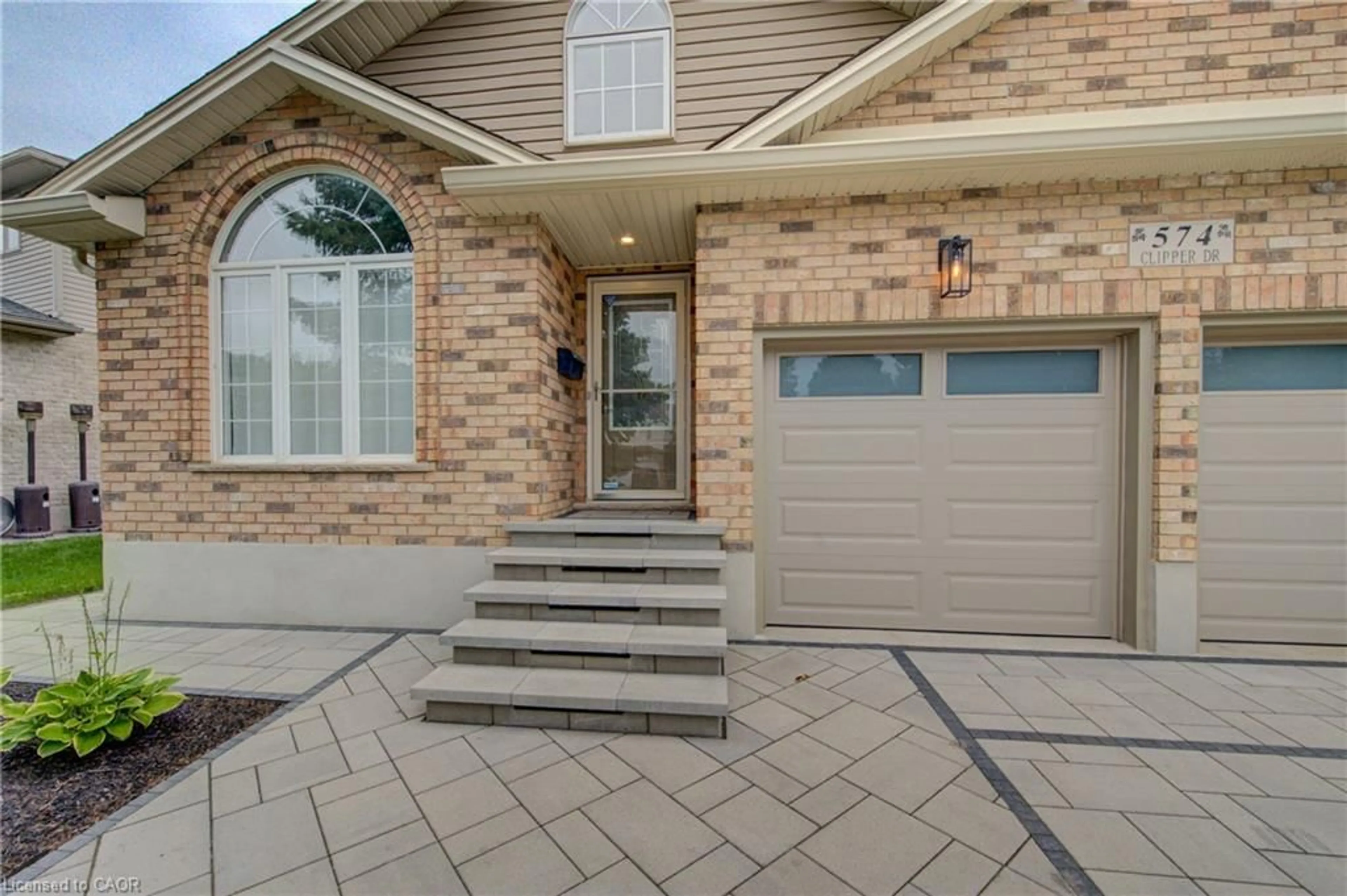Home with brick exterior material, street for 574 Clipper Dr, Waterloo Ontario N2K 4B4