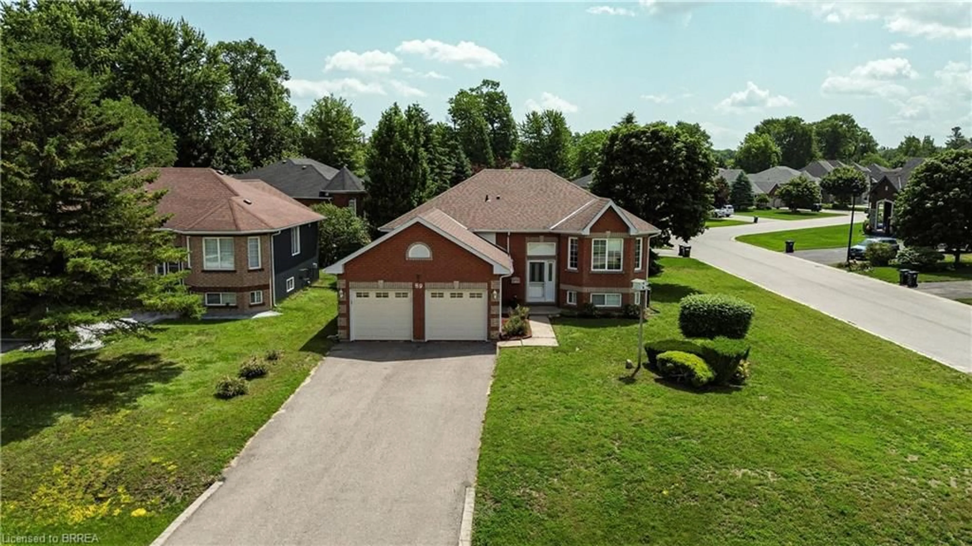 A pic from outside/outdoor area/front of a property/back of a property/a pic from drone, street for 89 Royal Beech Dr, Wasaga Beach Ontario L0L 2P0