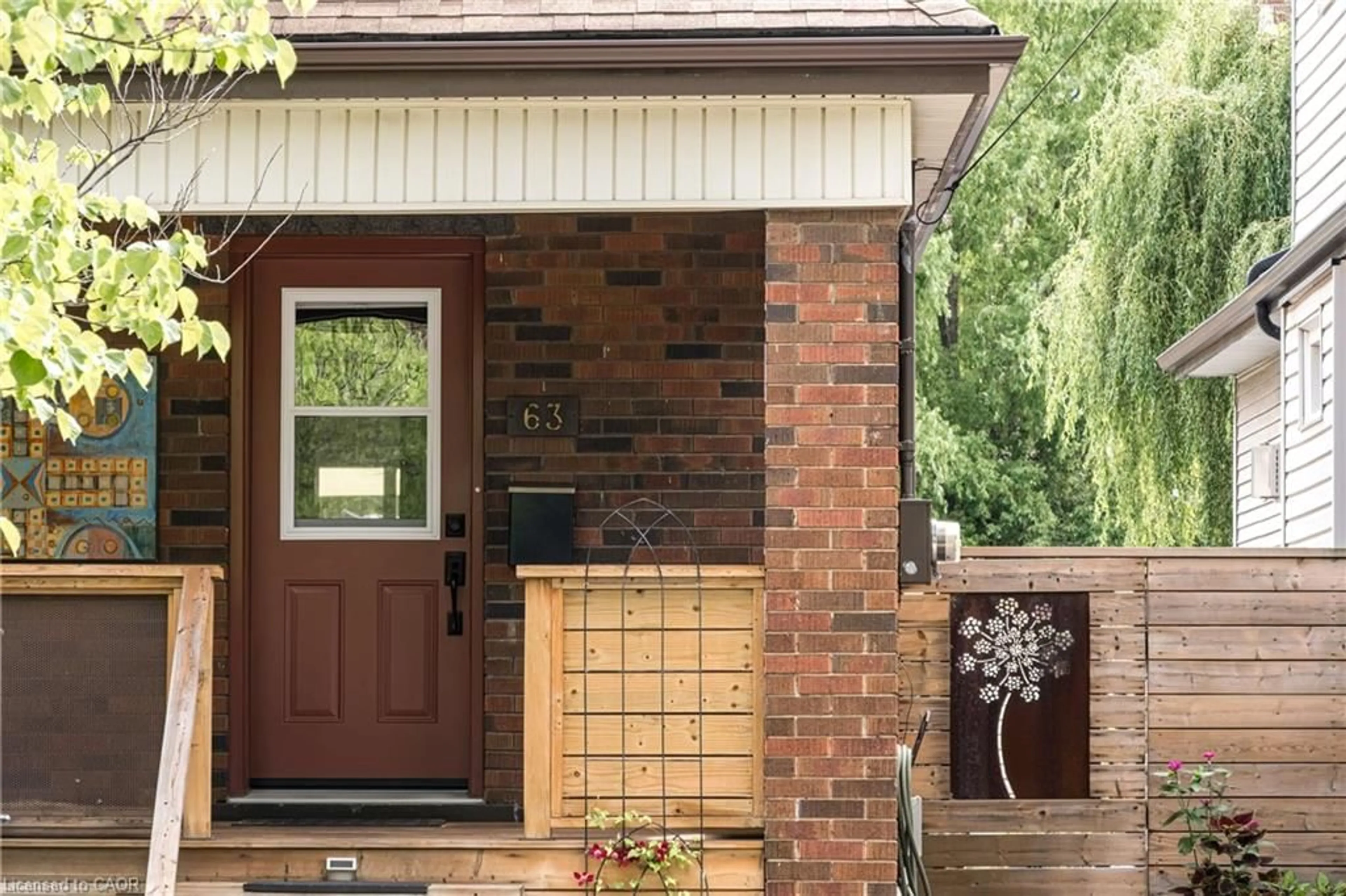 Home with brick exterior material, street for 63 Macdonald Ave, Hamilton Ontario L8P 4N8