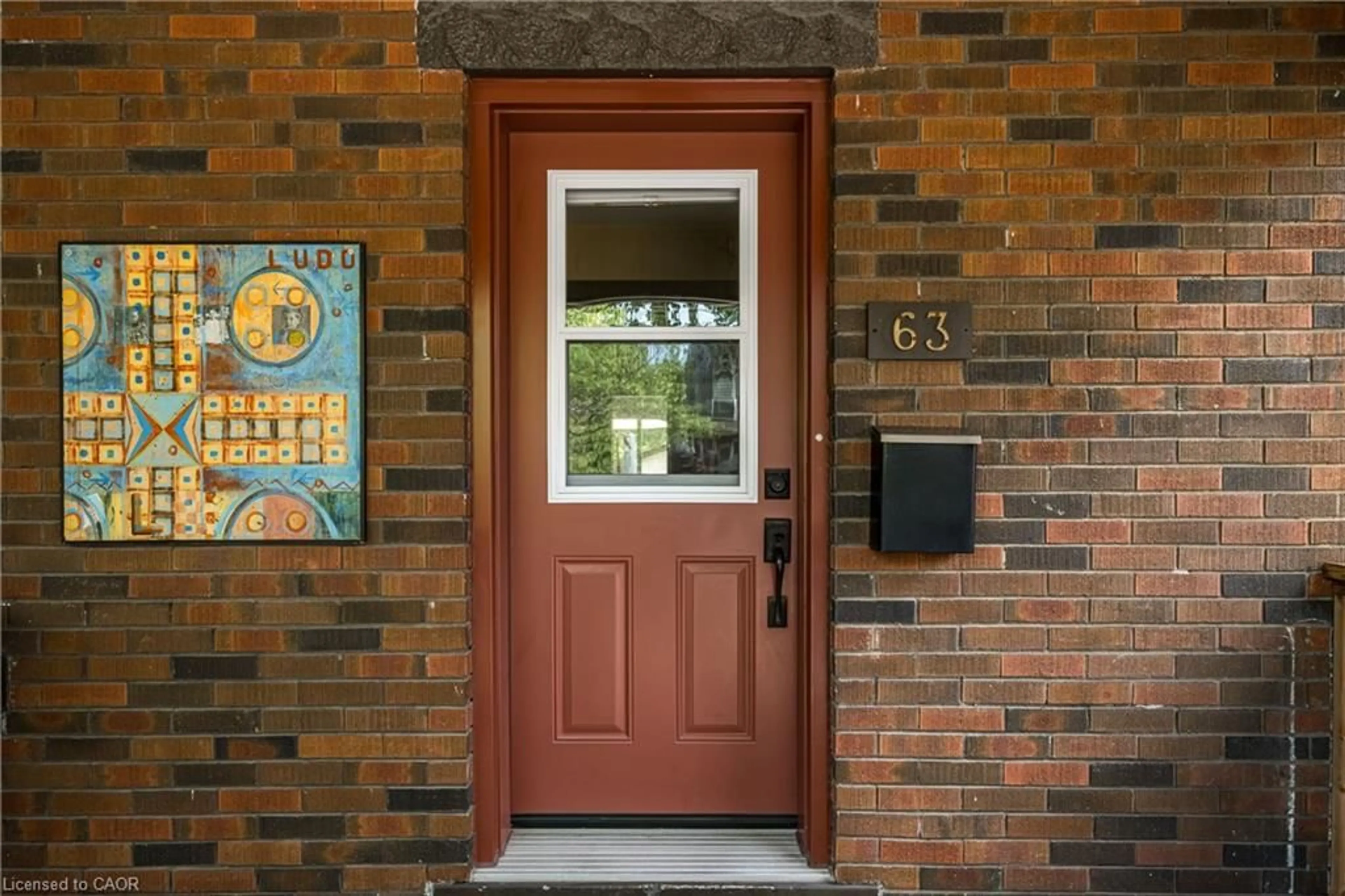 Indoor entryway for 63 Macdonald Ave, Hamilton Ontario L8P 4N8
