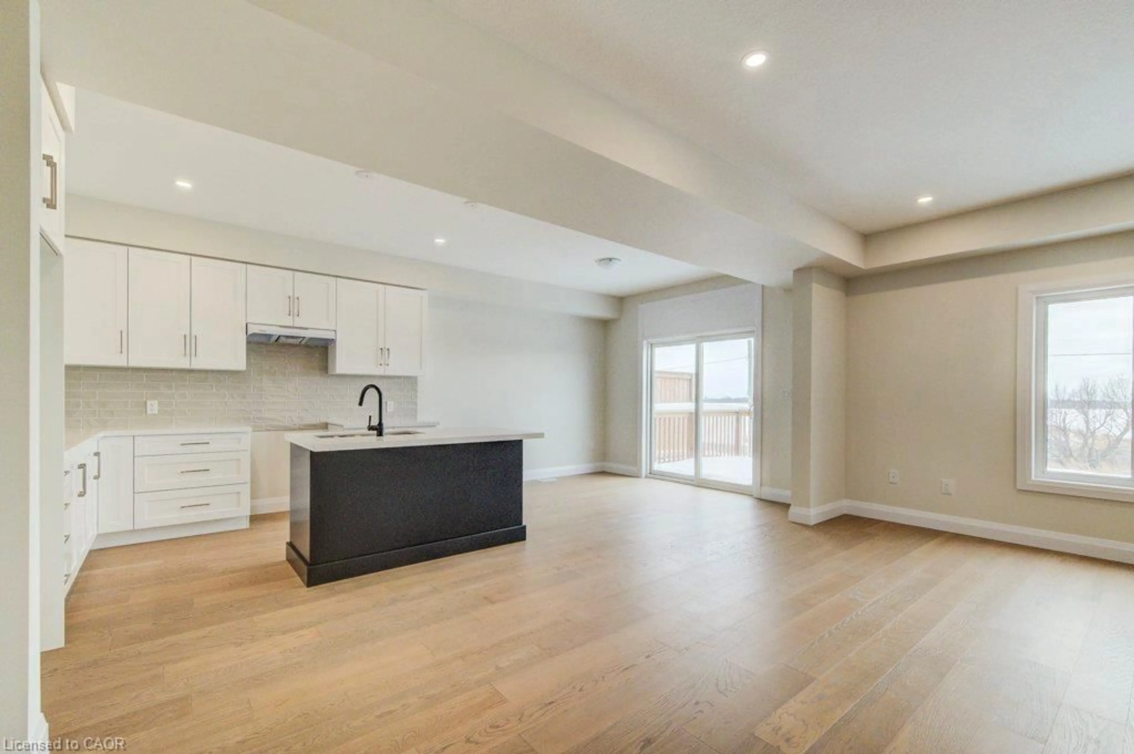 Open concept kitchen, wood/laminate floor for 231 Applewood St, Plattsville Ontario N0J 1S0