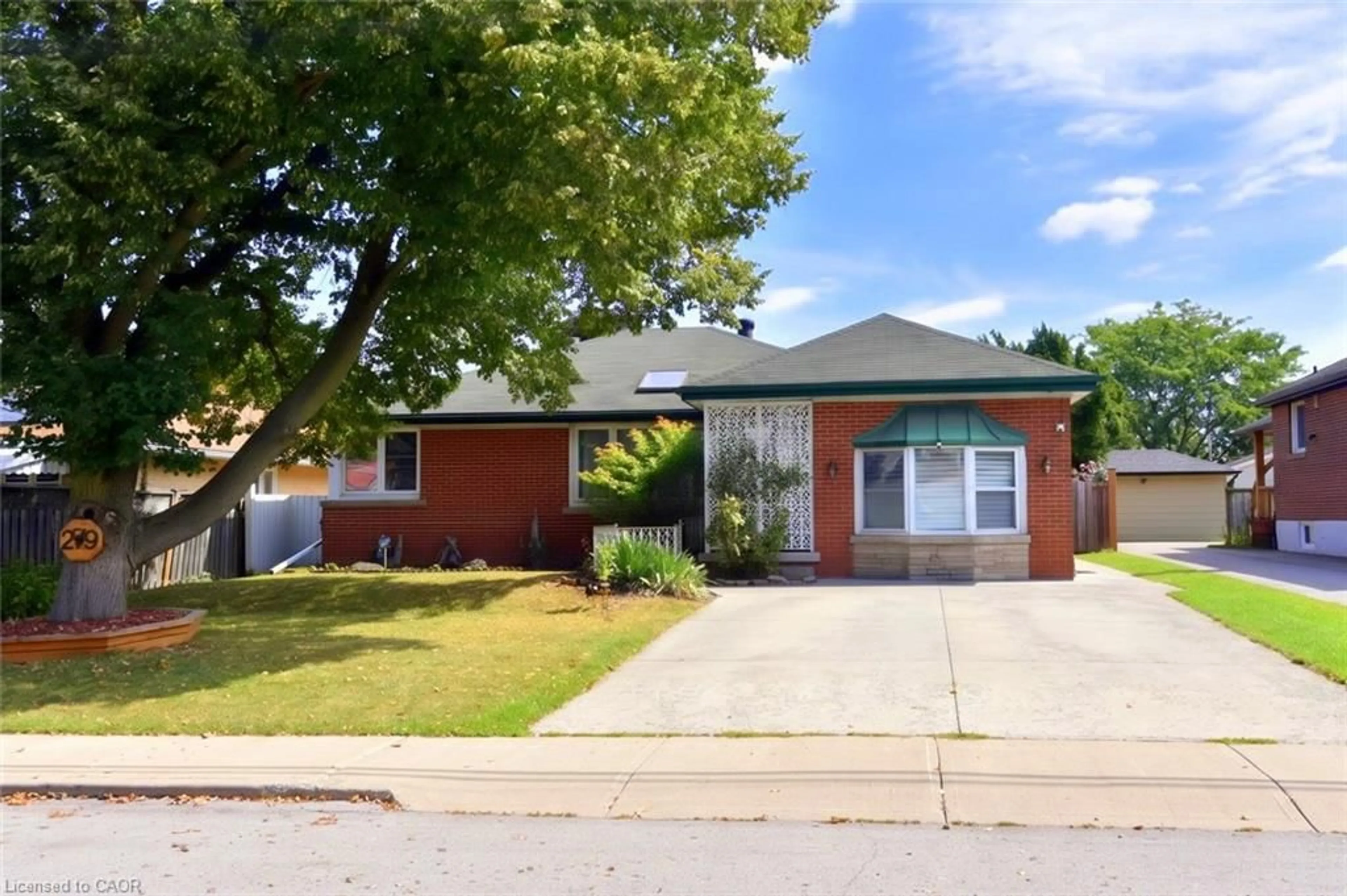 Home with brick exterior material, street for 279 Rosedale Ave, Hamilton Ontario L8K 4N6