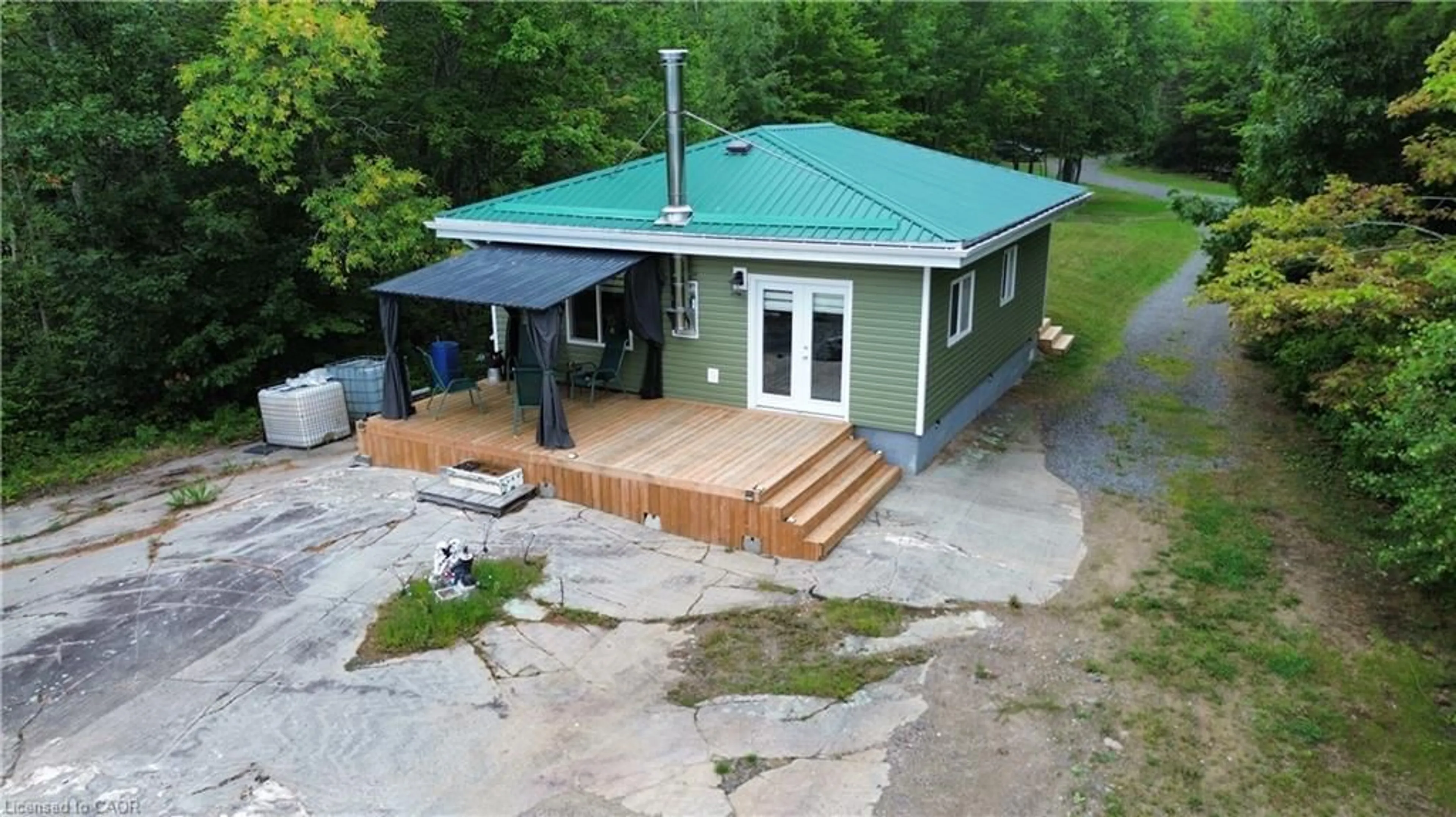 A pic from outside/outdoor area/front of a property/back of a property/a pic from drone, building for 354 Brennan Harbour Rd, Spanish Ontario P0P 2A0