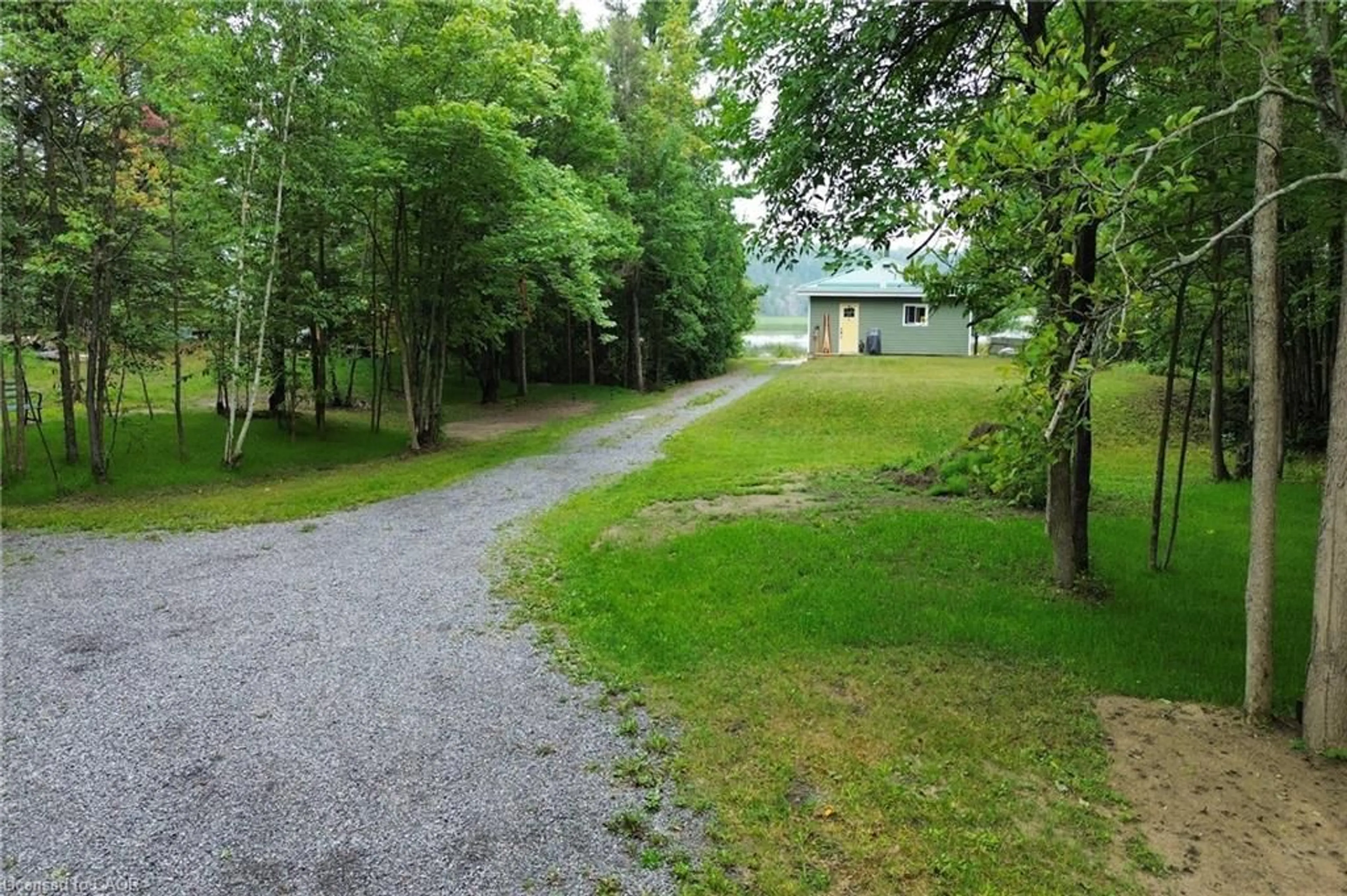 A pic from outside/outdoor area/front of a property/back of a property/a pic from drone, forest/trees view for 354 Brennan Harbour Rd, Spanish Ontario P0P 2A0