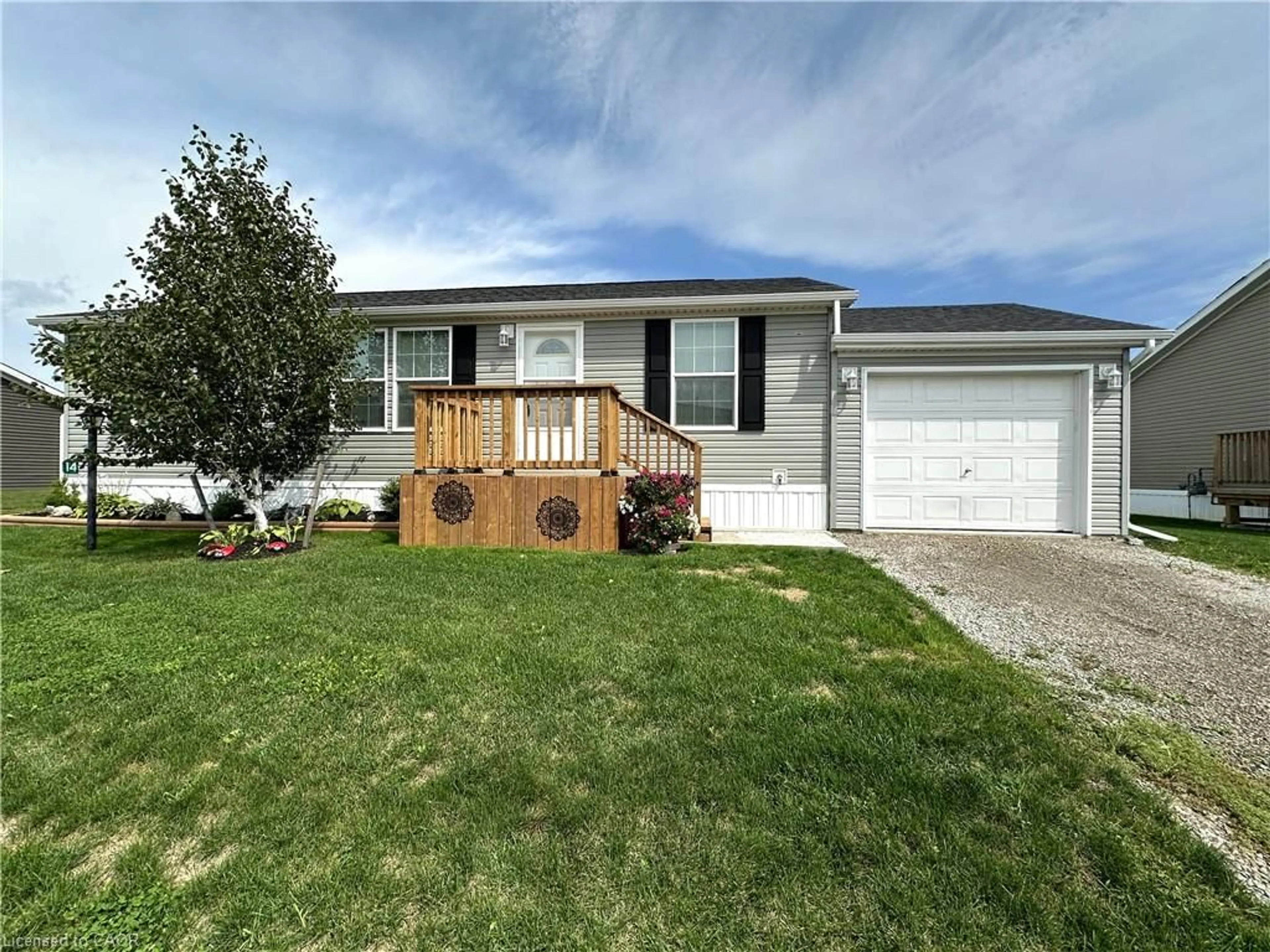 Home with vinyl exterior material, street for 14 Copper Beech Dr, Haldimand County Ontario N0A 1L0