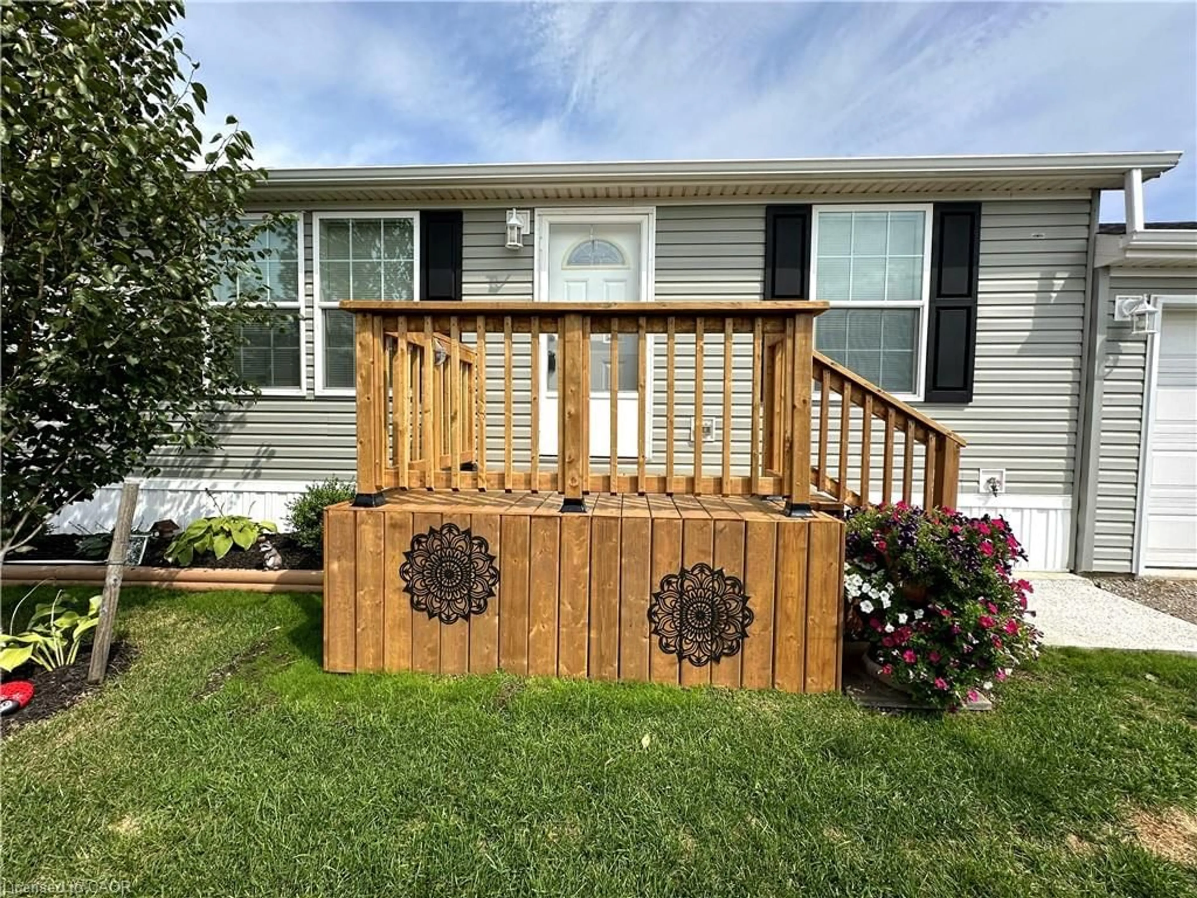 Home with vinyl exterior material, street for 14 Copper Beech Dr, Haldimand County Ontario N0A 1L0
