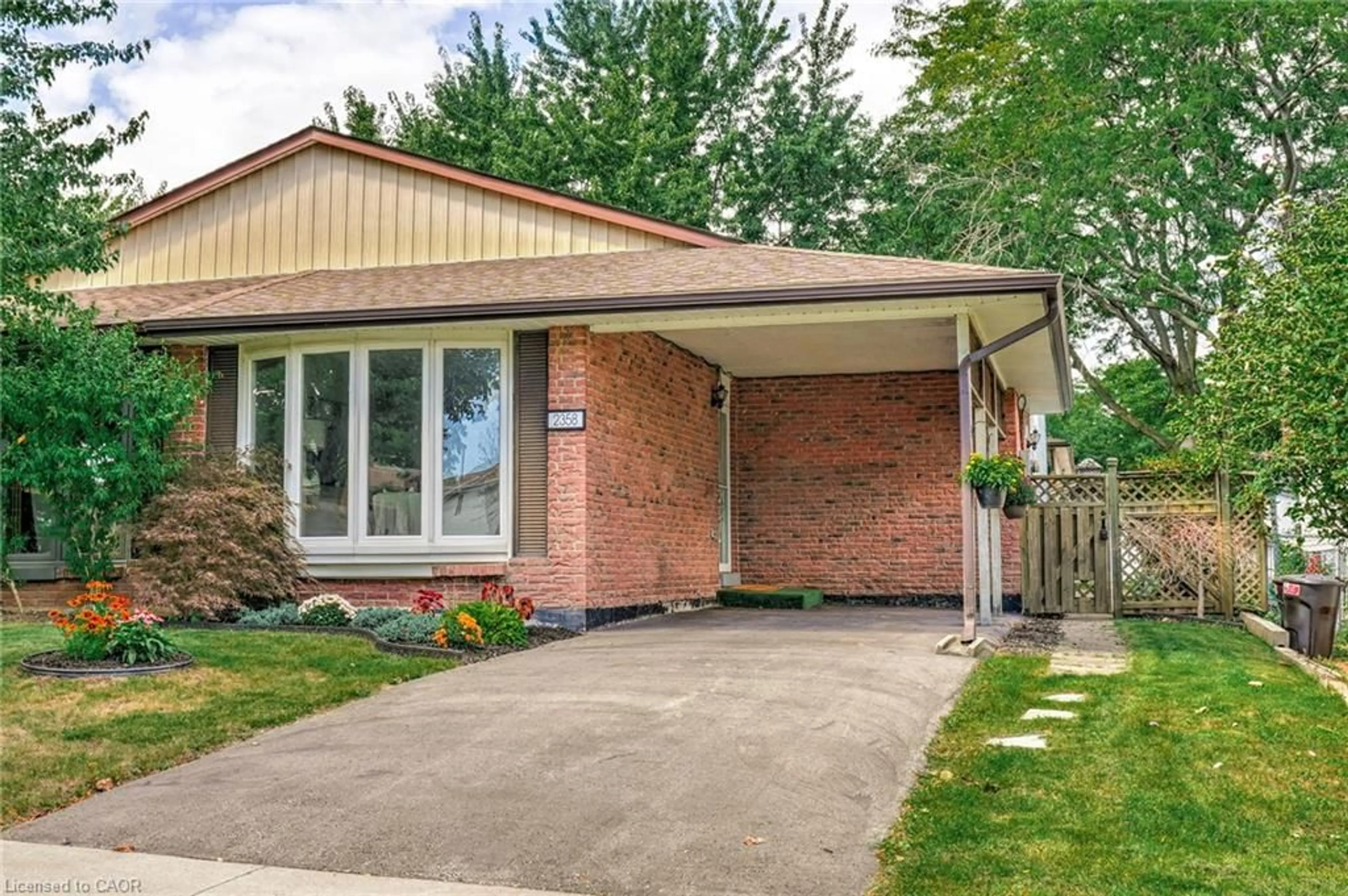 Home with brick exterior material, street for 2358 Greenbank Trail, Burlington Ontario L7P 3S8