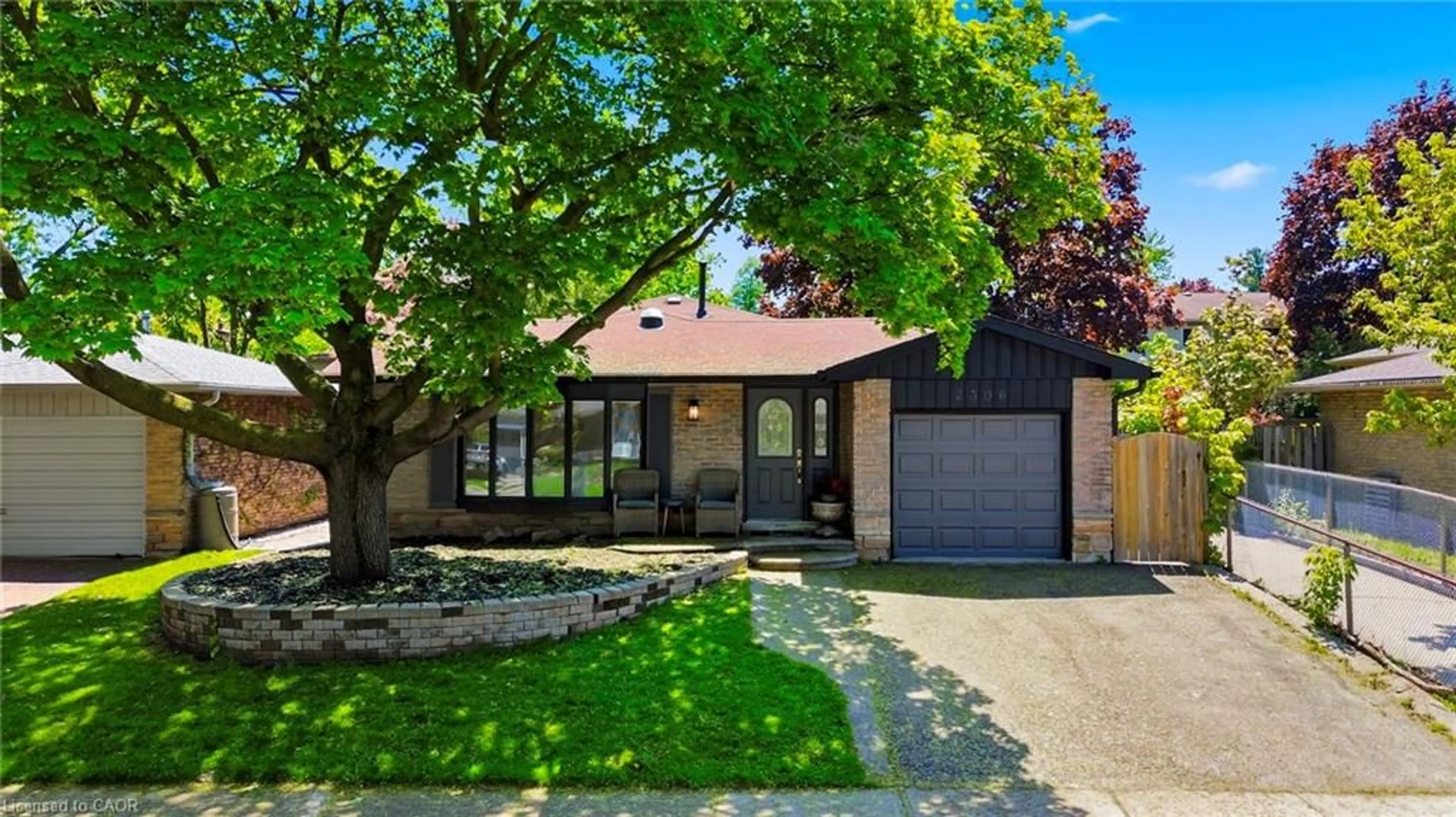 Home with brick exterior material, street for 2306 Devon Rd, Oakville Ontario L6J 5R4