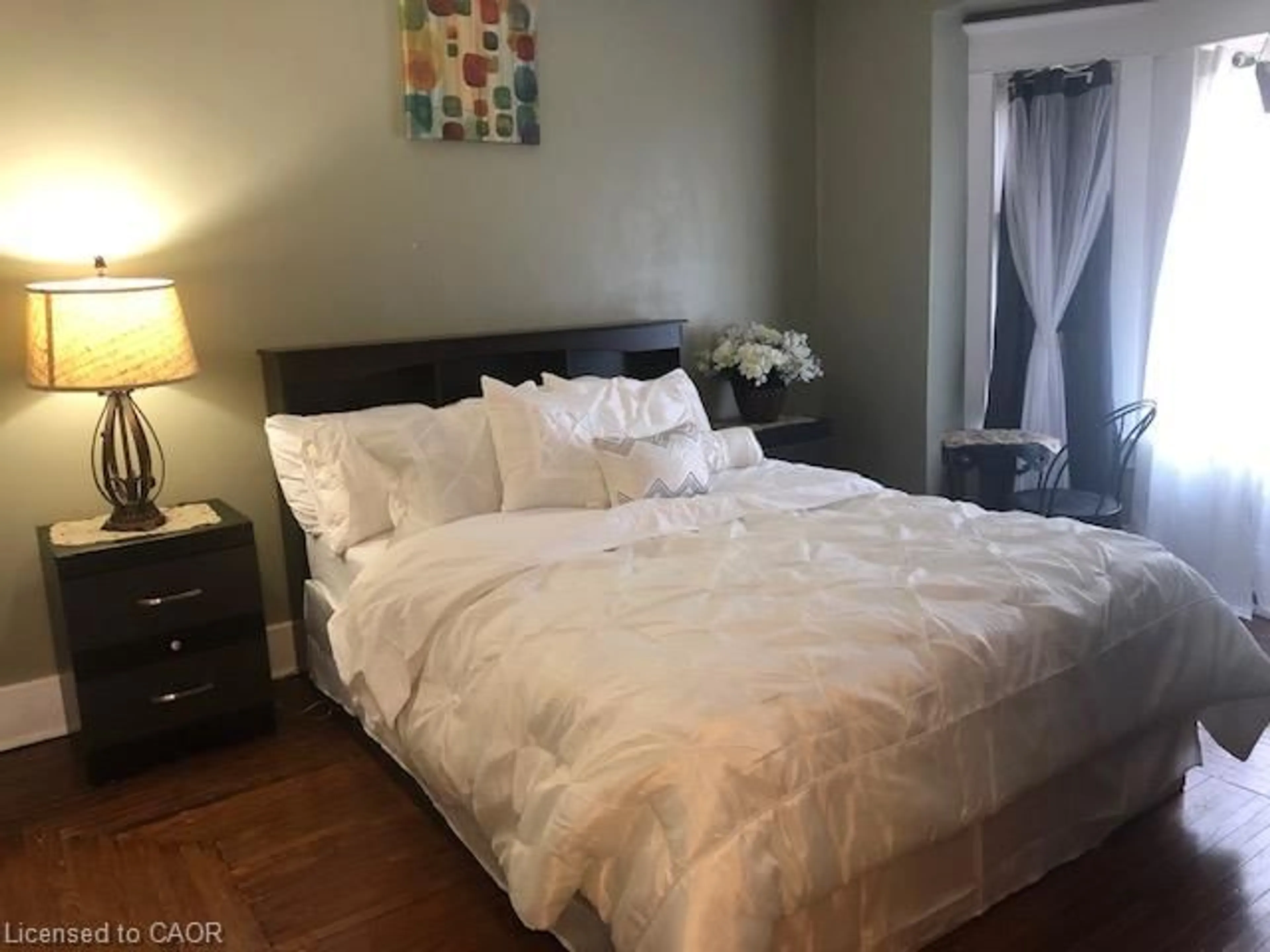 Bedroom with bed, wood/laminate floor for 171 Owen St, Simcoe Ontario N3Y 2T8