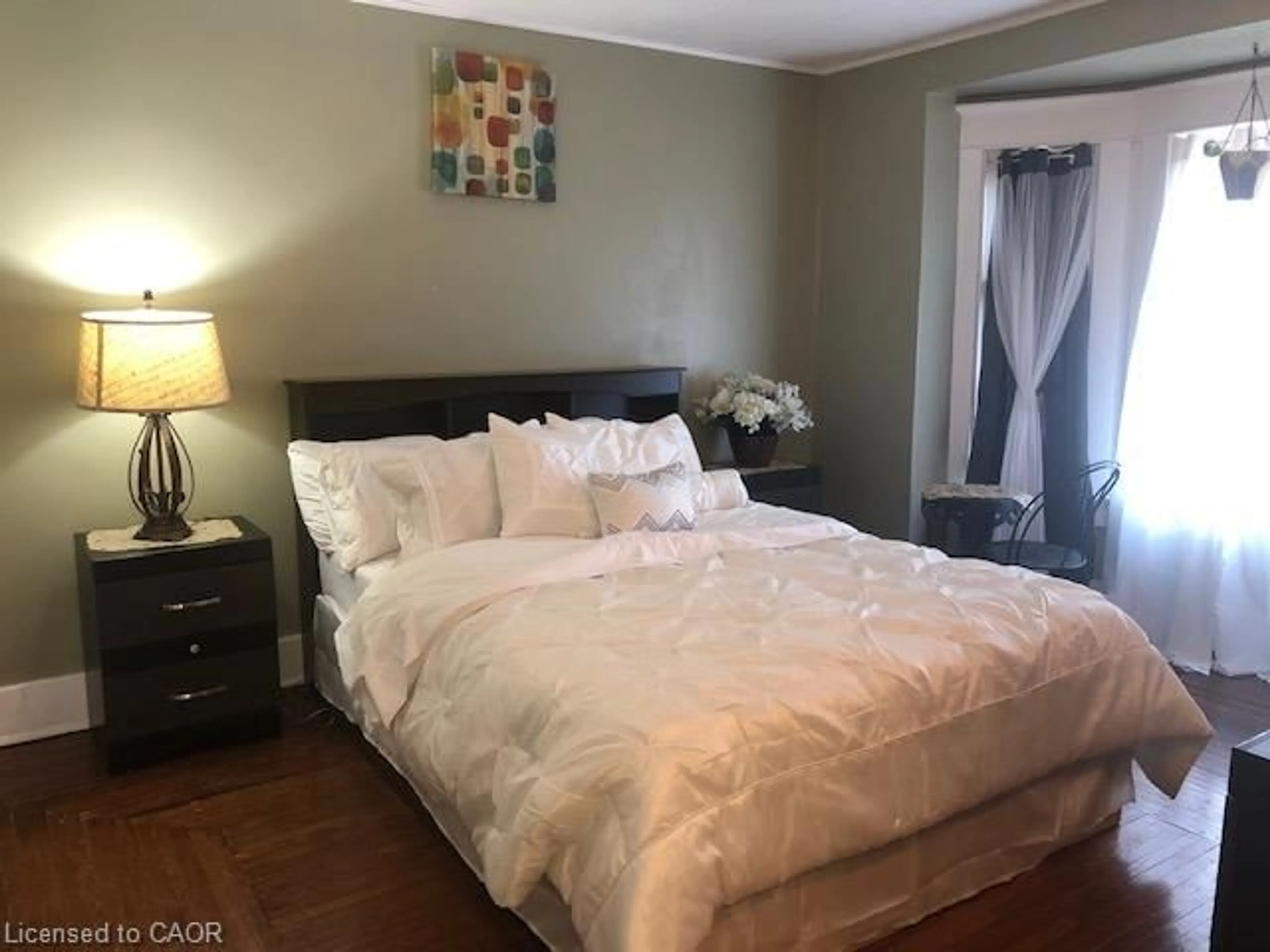 Bedroom with bed, wood/laminate floor for 171 Owen St, Simcoe Ontario N3Y 2T8