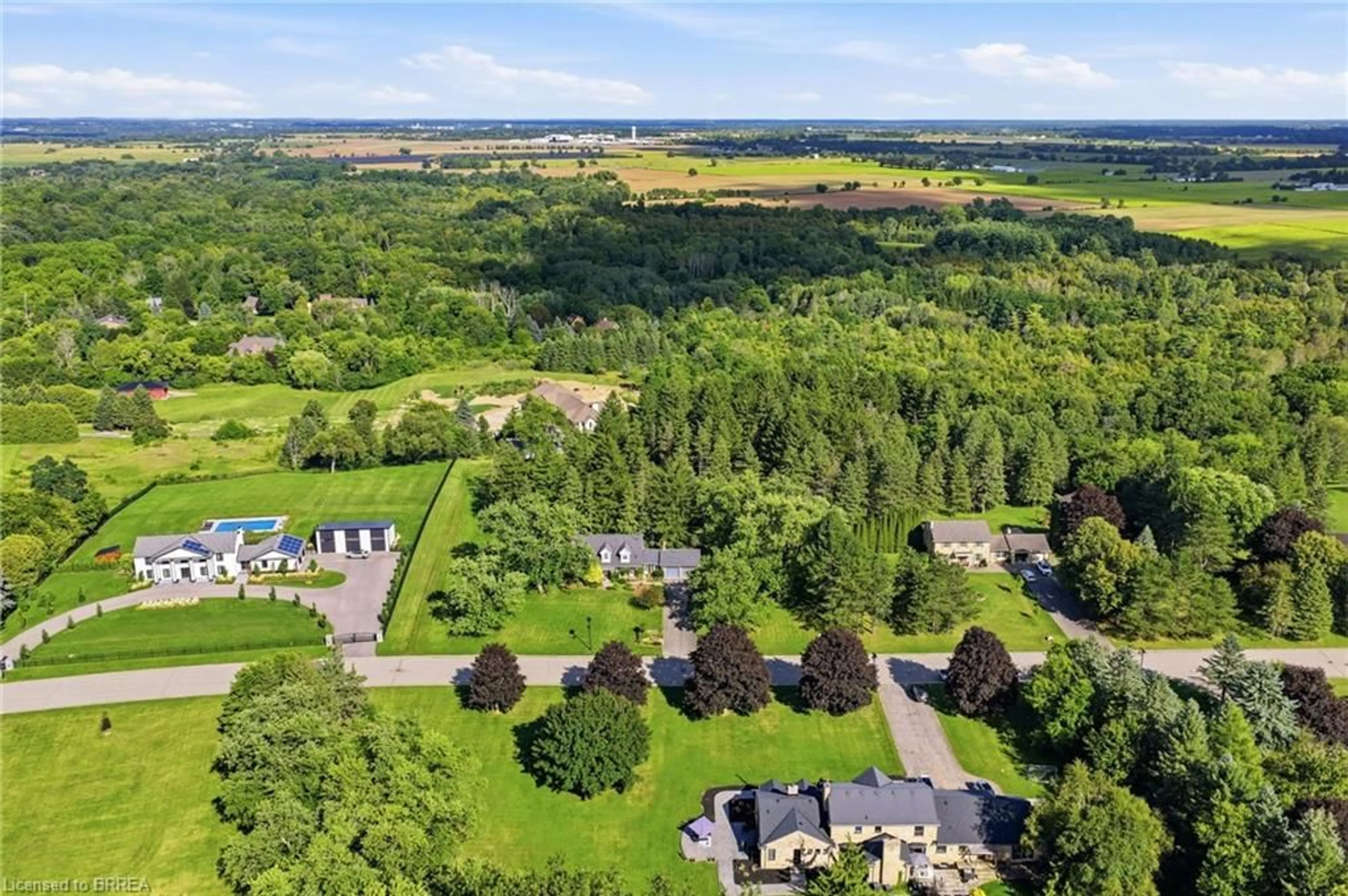 A pic from outside/outdoor area/front of a property/back of a property/a pic from drone, mountain view for 12 Highland Dr, Brantford Ontario N3T 5L7