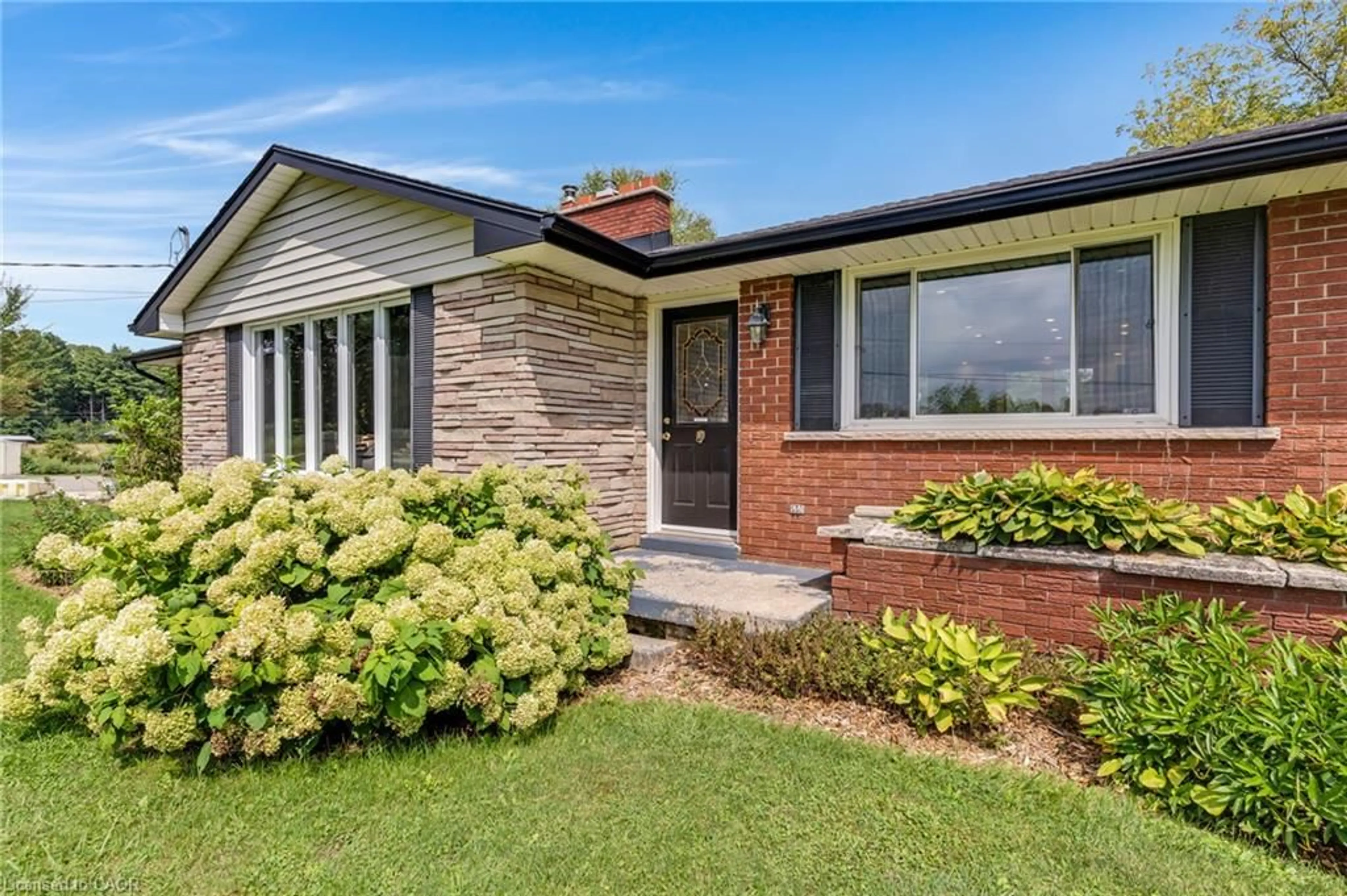 Home with brick exterior material, street for 2172 Centre Rd, Flamborough Ontario L0P 1B0