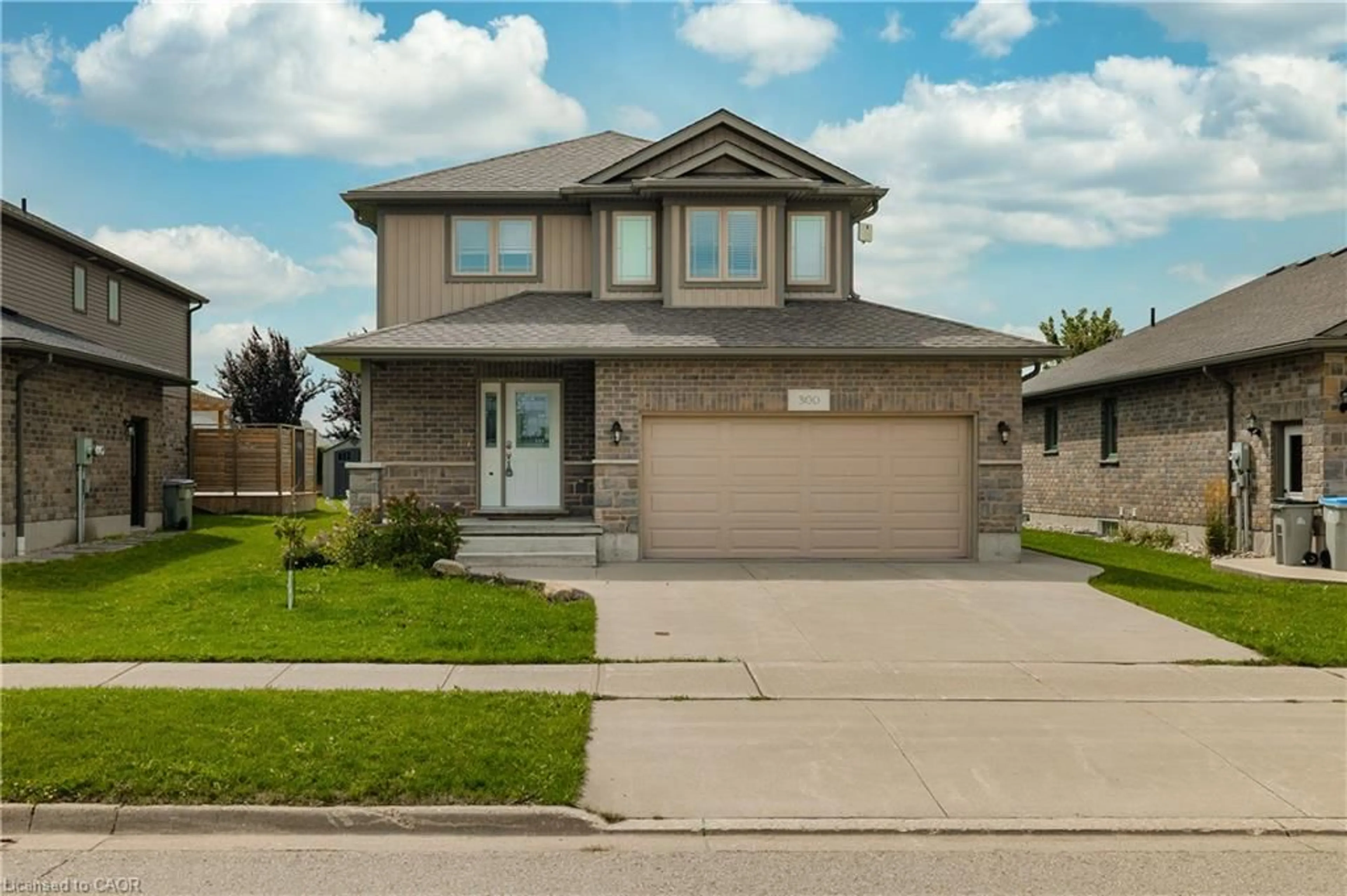 Home with brick exterior material, street for 300 Hutton St, Listowel Ontario N4W 0C1