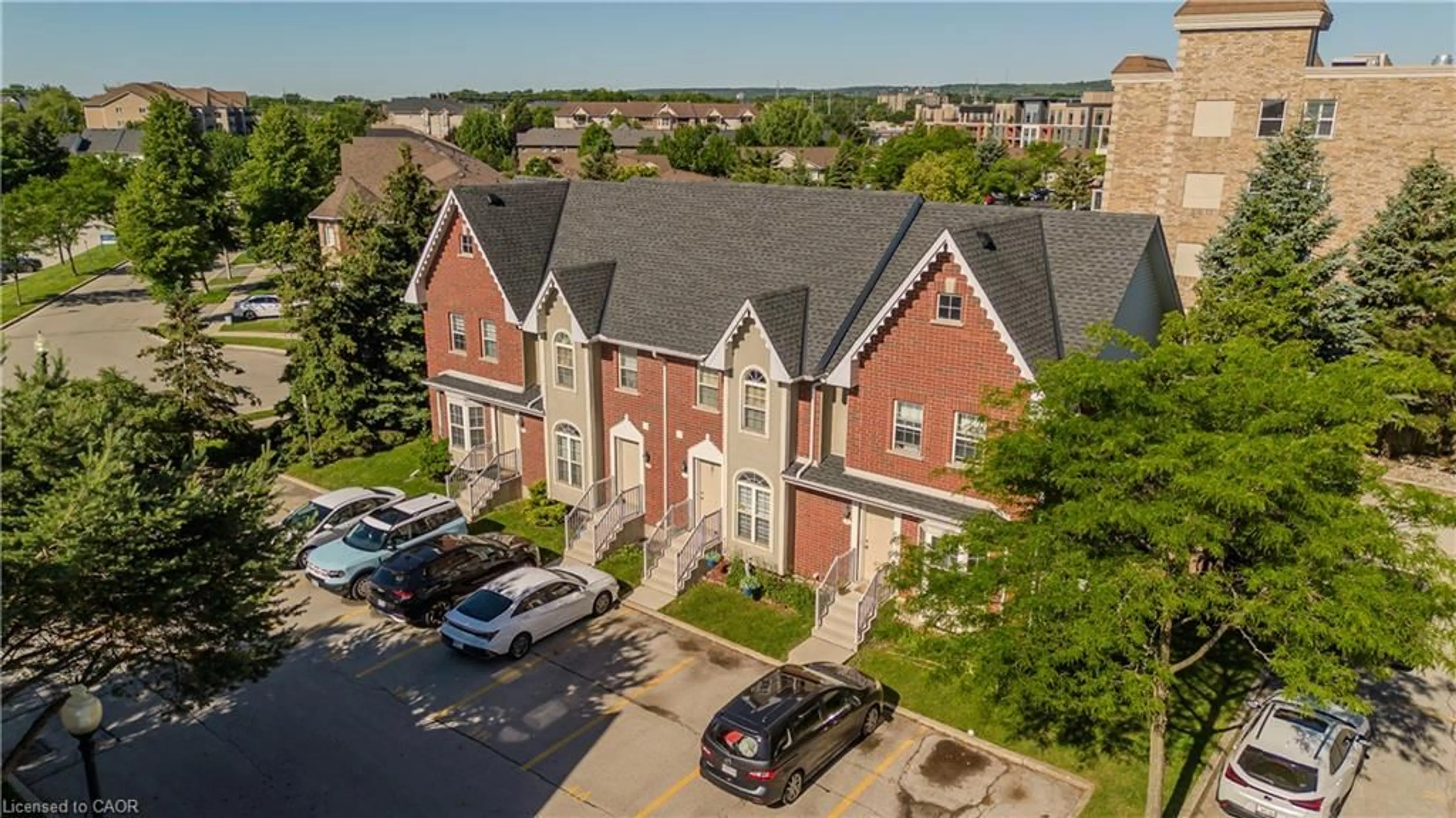 A pic from outside/outdoor area/front of a property/back of a property/a pic from drone, city buildings view from balcony for 4200 Kilmer Dr #3, Burlington Ontario L7M 4Y2