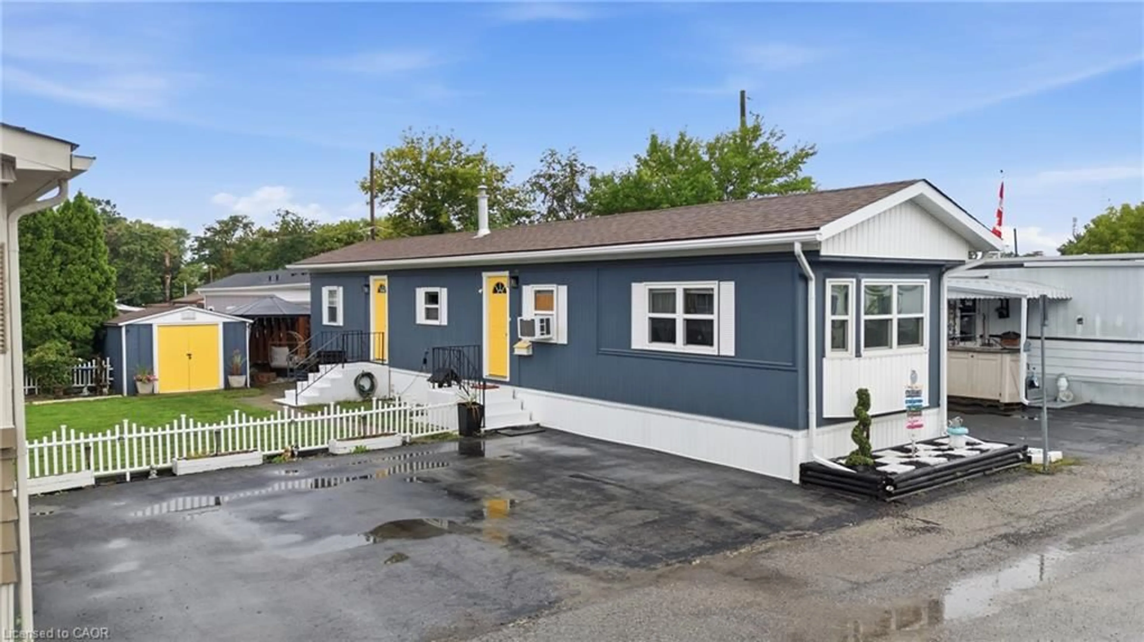Home with vinyl exterior material, street for 241 St Paul St #317, St. Catharines Ontario L2S 2E5