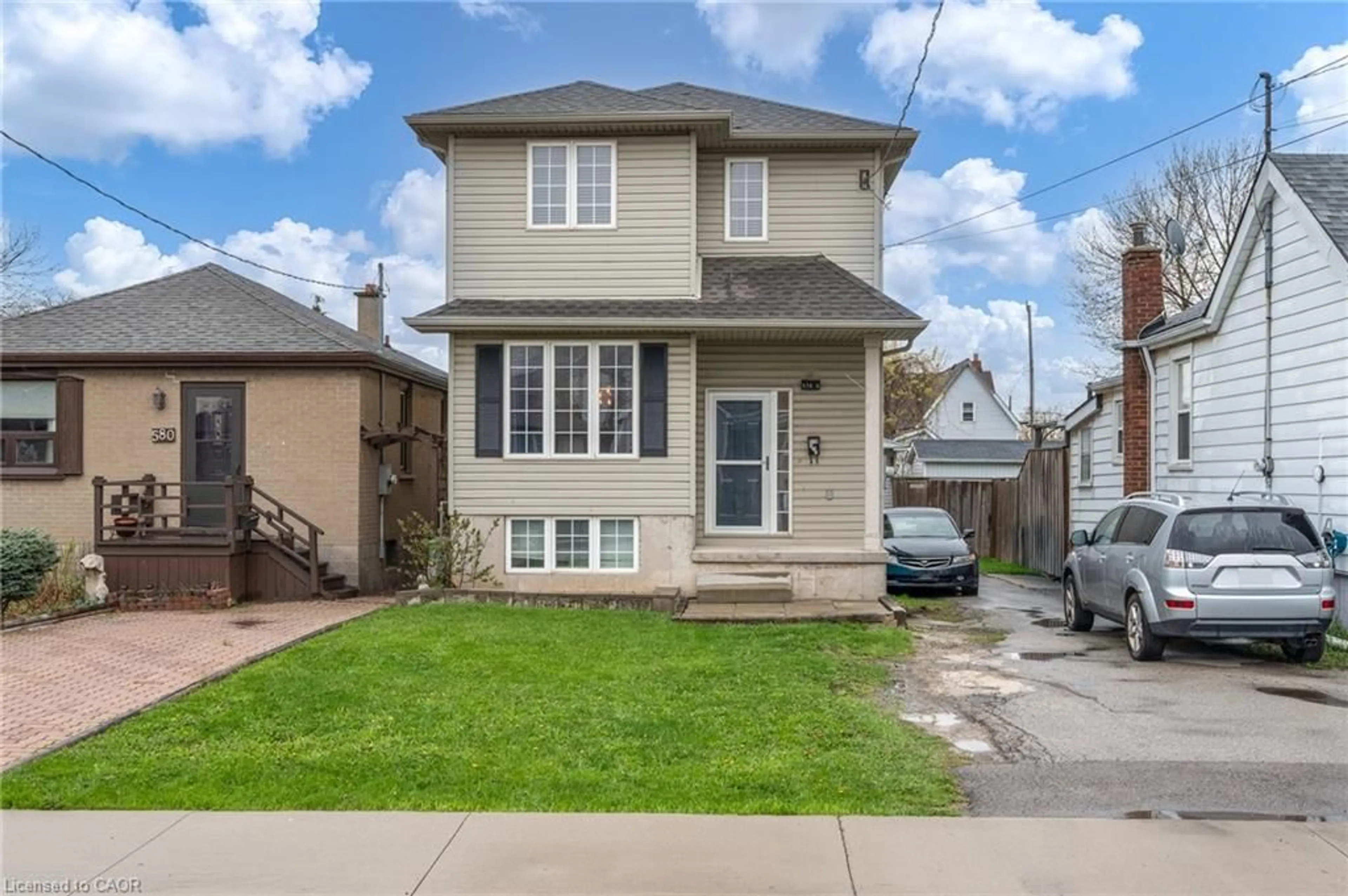 Home with vinyl exterior material, street for 578 1/2 Barnaby St, Hamilton Ontario L8H 6T9