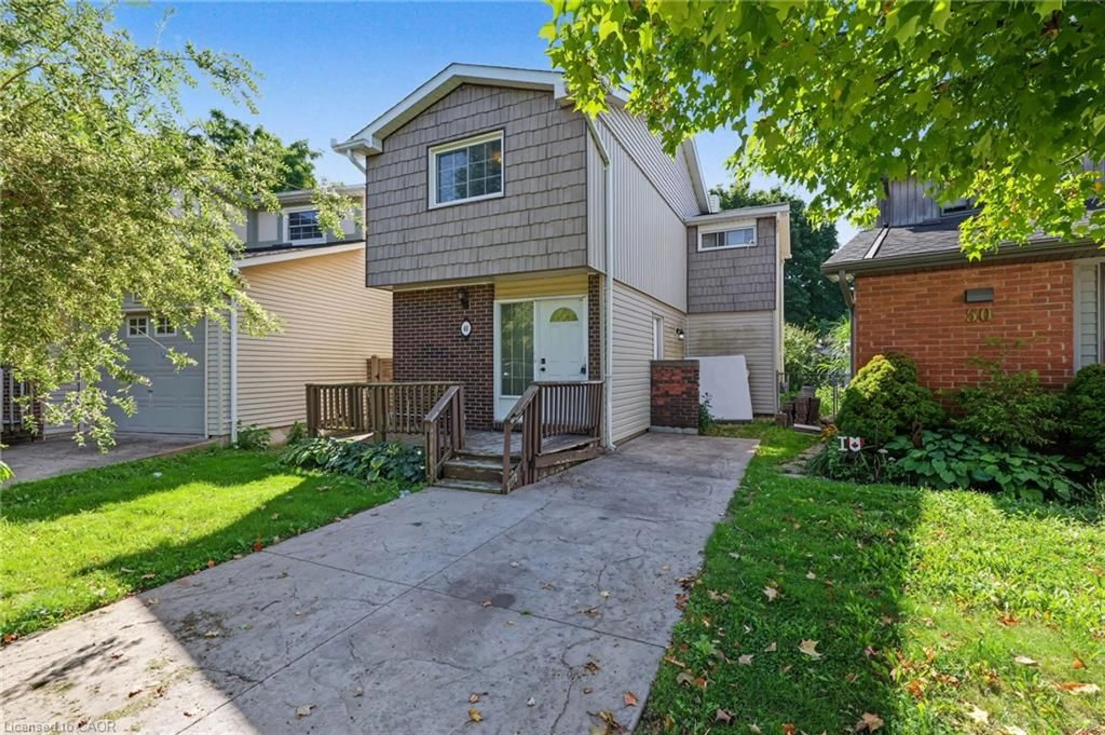 Home with vinyl exterior material, street for 46 Olympic Cres, London Ontario N6G 3P6