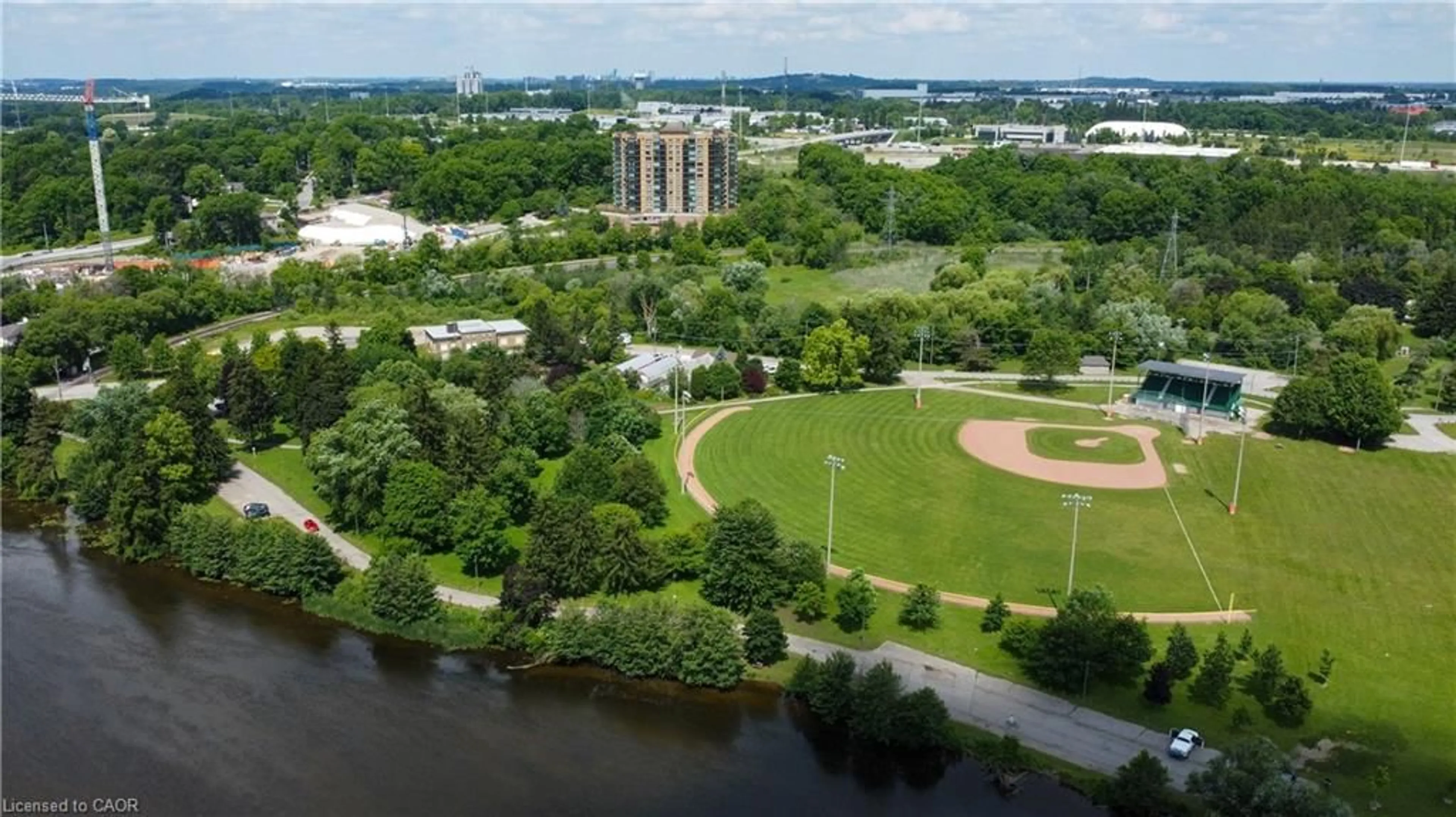 A pic from outside/outdoor area/front of a property/back of a property/a pic from drone, water/lake/river/ocean view for 237 King St #305, Cambridge Ontario N3H 5L2