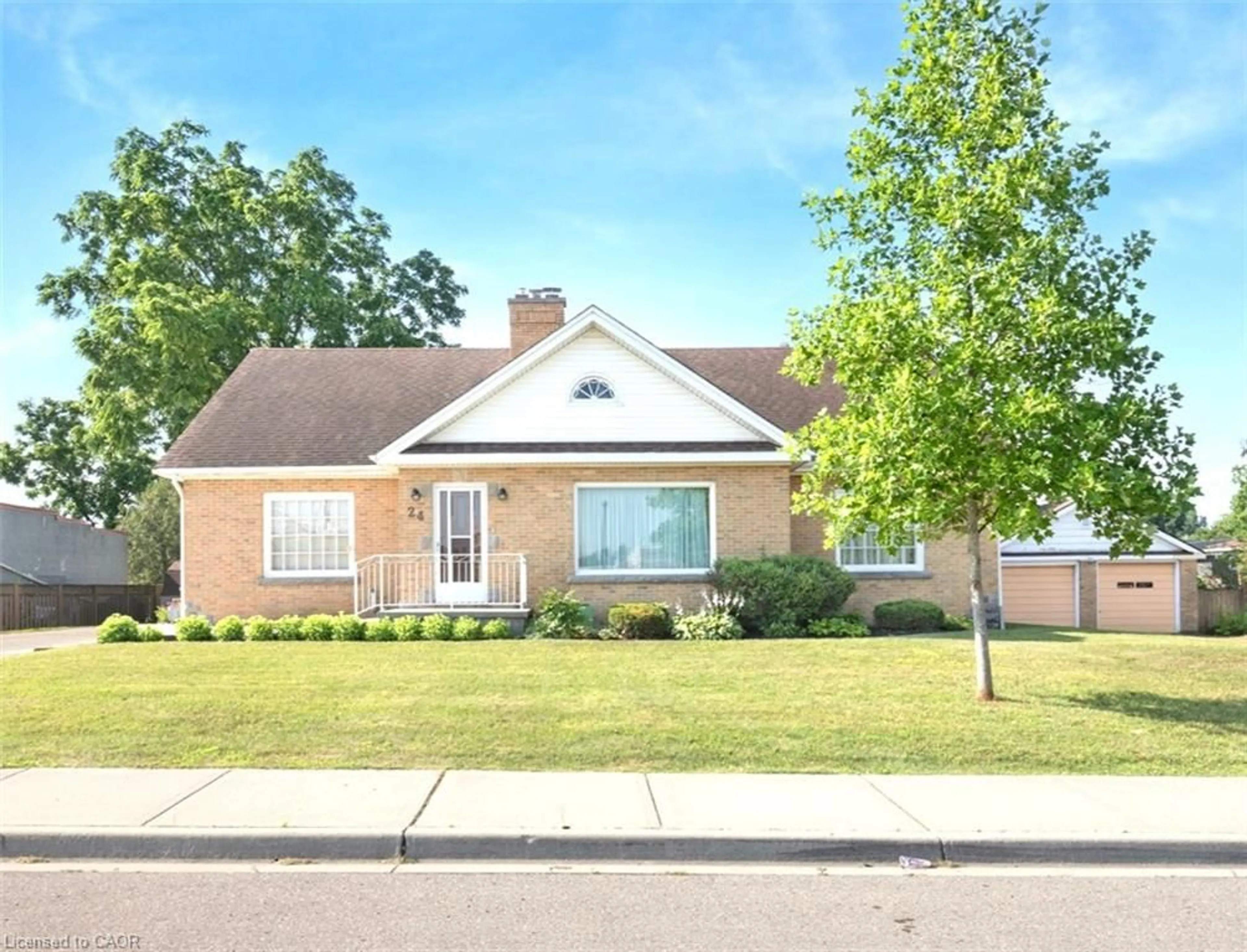 Home with brick exterior material, street for 24 Pine St, Delhi Ontario N4B 1N6
