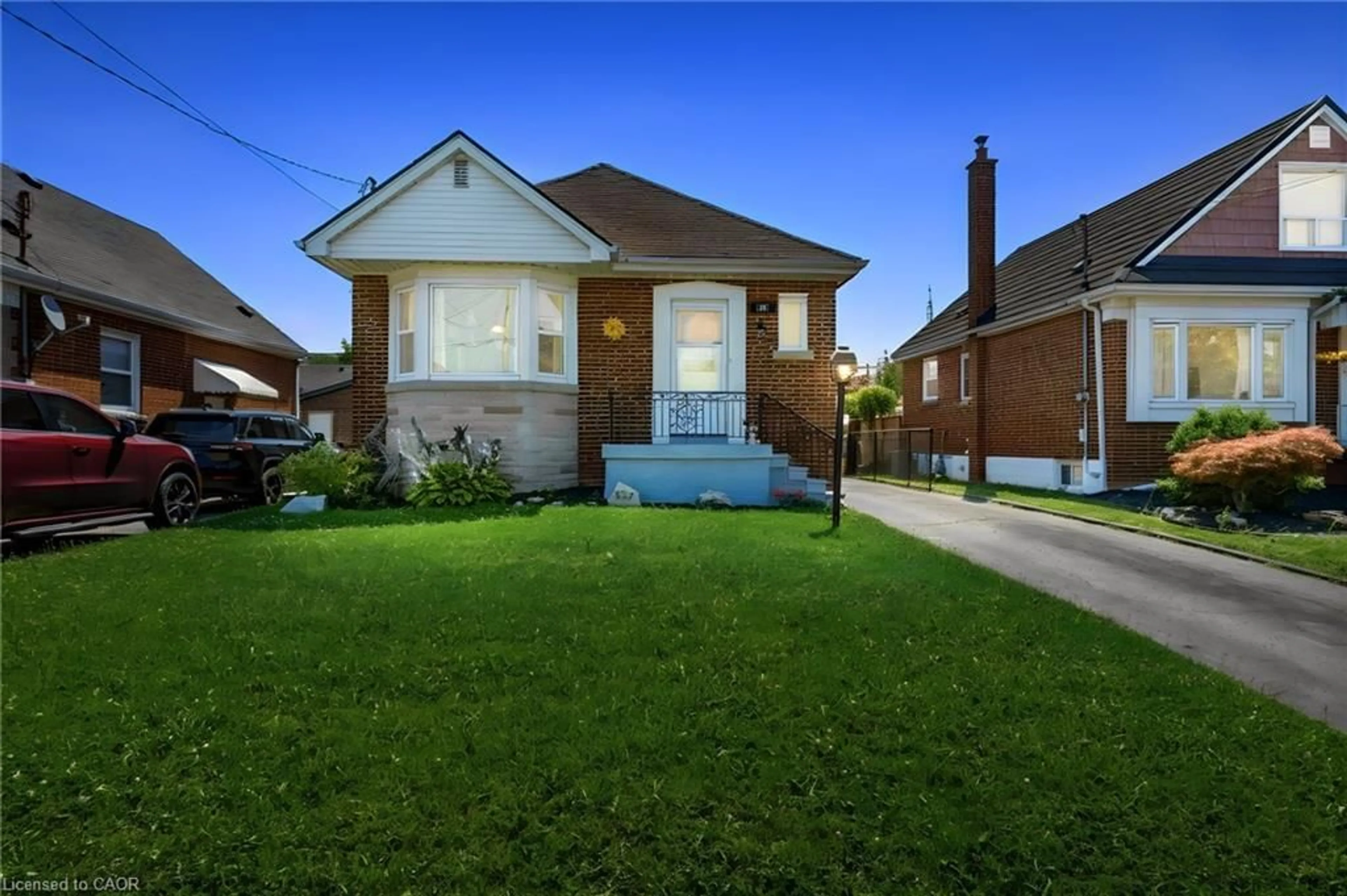 Home with brick exterior material, street for 127 Taylor Ave, Hamilton Ontario L8K 3T1