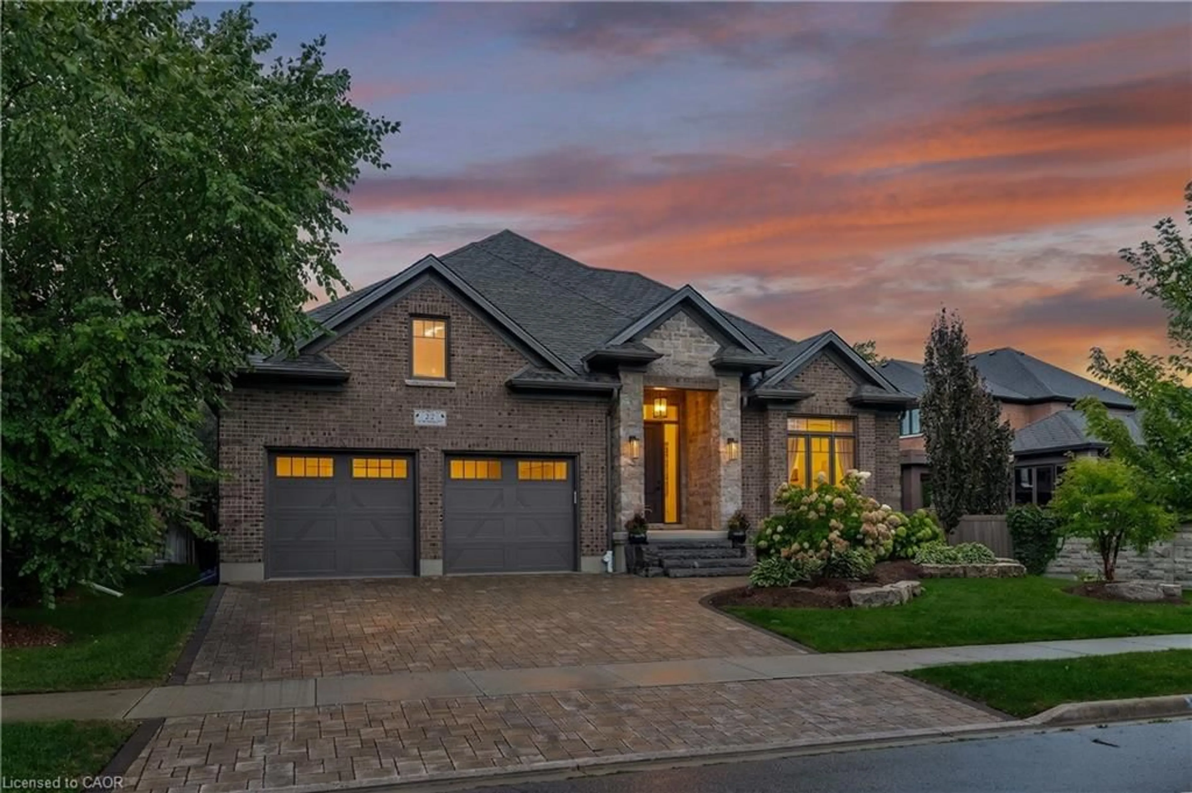 Home with brick exterior material, street for 15 Langton Dr, Kitchener Ontario N2P 2X9