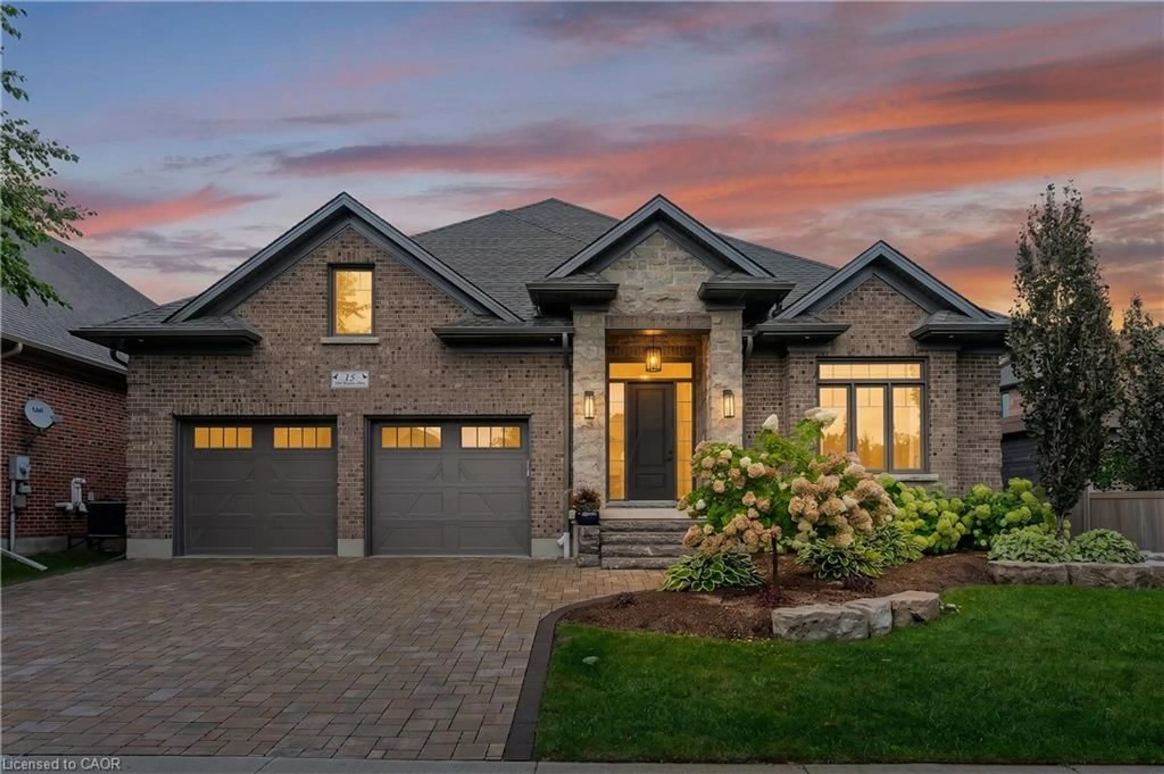 Home with brick exterior material, street for 15 Langton Dr, Kitchener Ontario N2P 2X9