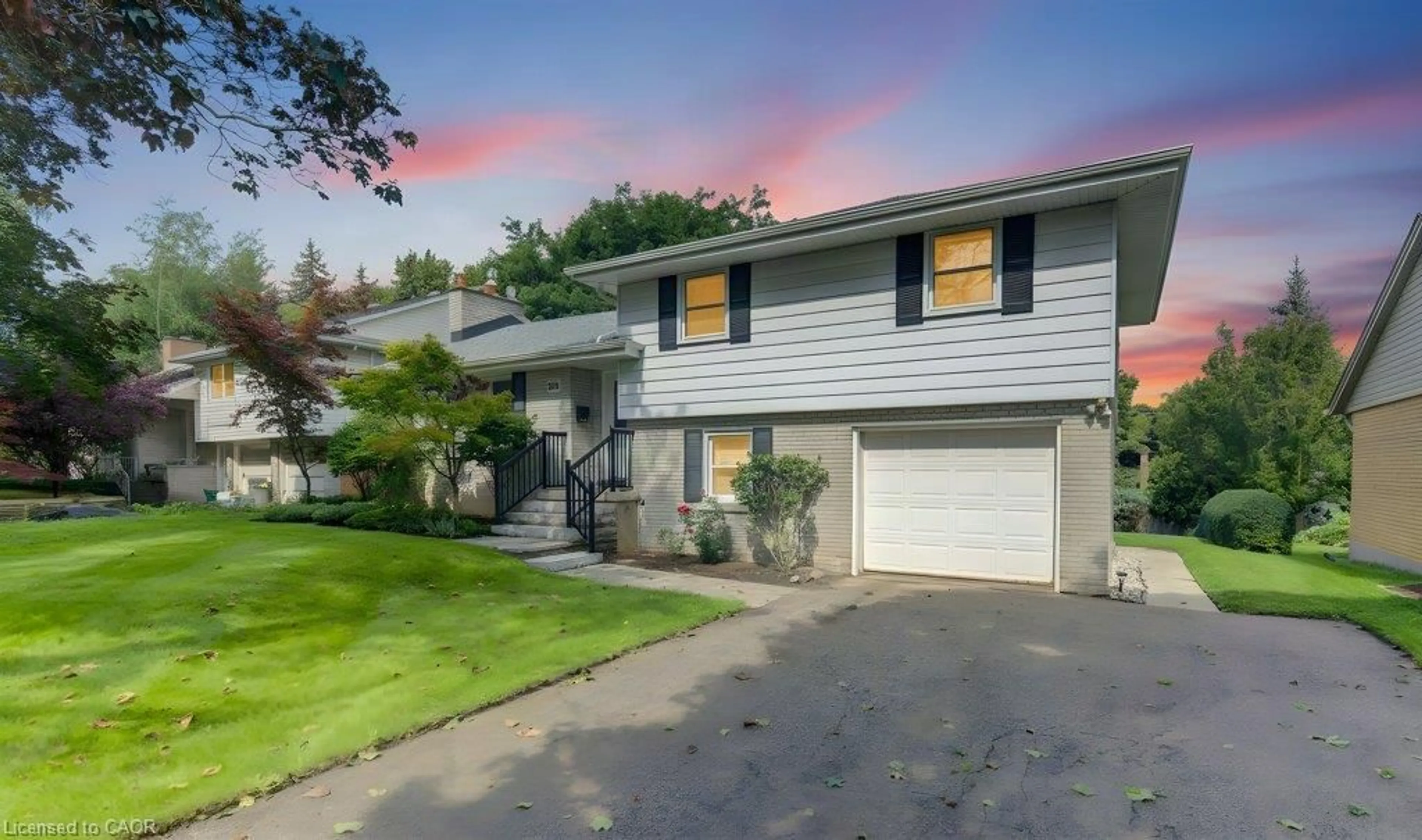 Home with vinyl exterior material, street for 204 Stanley Dr, Waterloo Ontario N2L 1H4