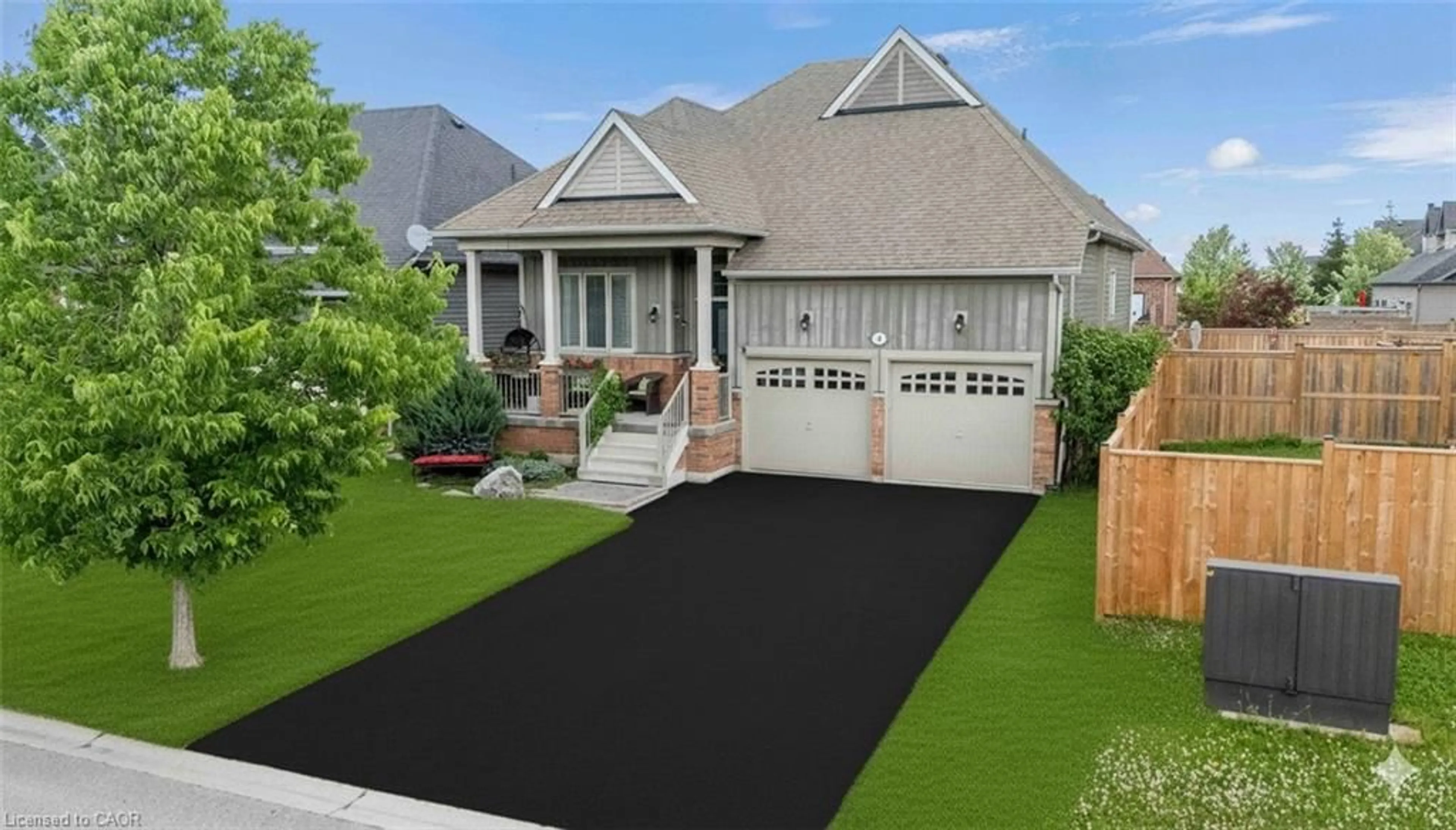 Home with vinyl exterior material, street for 18 Hughes St, Collingwood Ontario L9Y 0W7