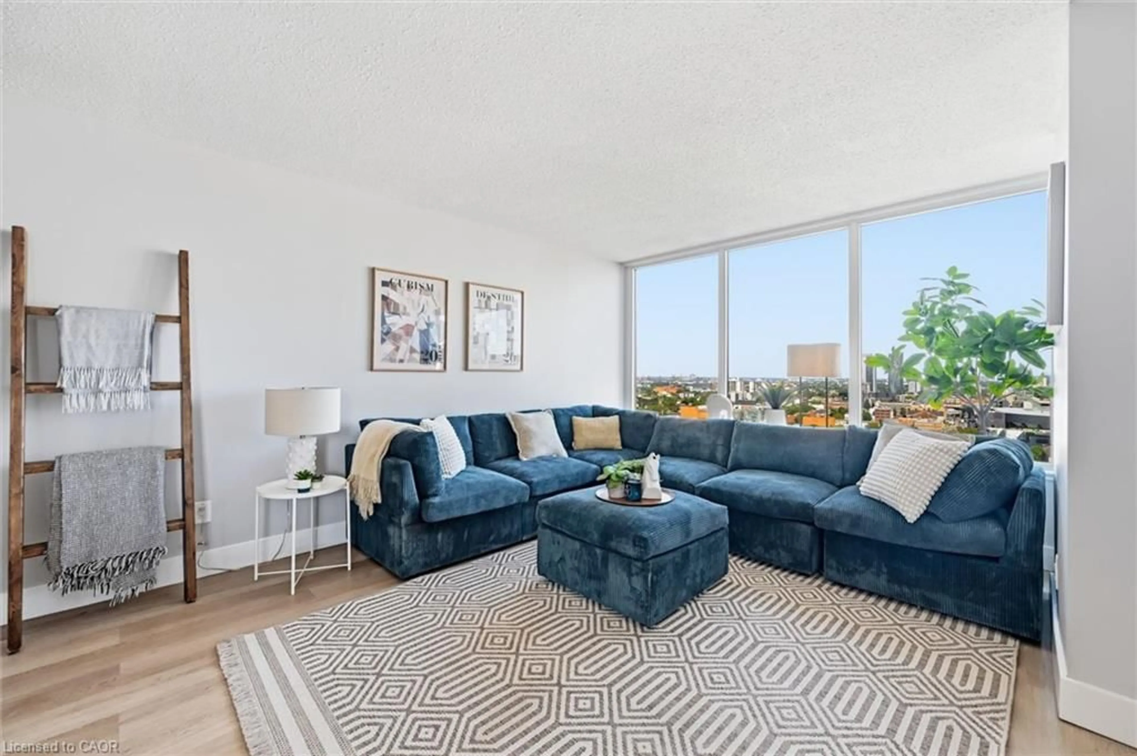 Living room with furniture, unknown for 75 Queen St #1903, Hamilton Ontario L8R 3J3