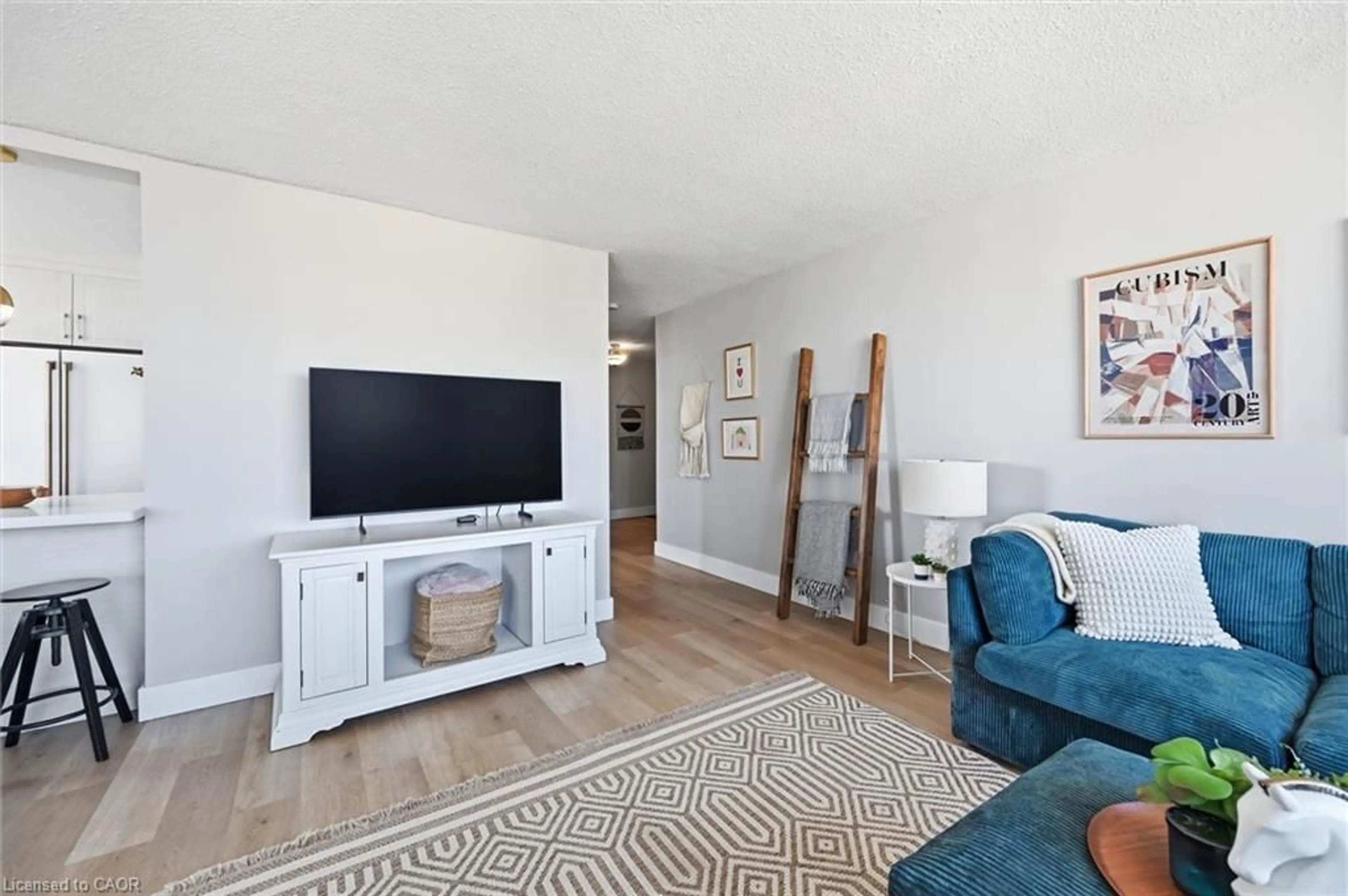 Living room with furniture, unknown for 75 Queen St #1903, Hamilton Ontario L8R 3J3