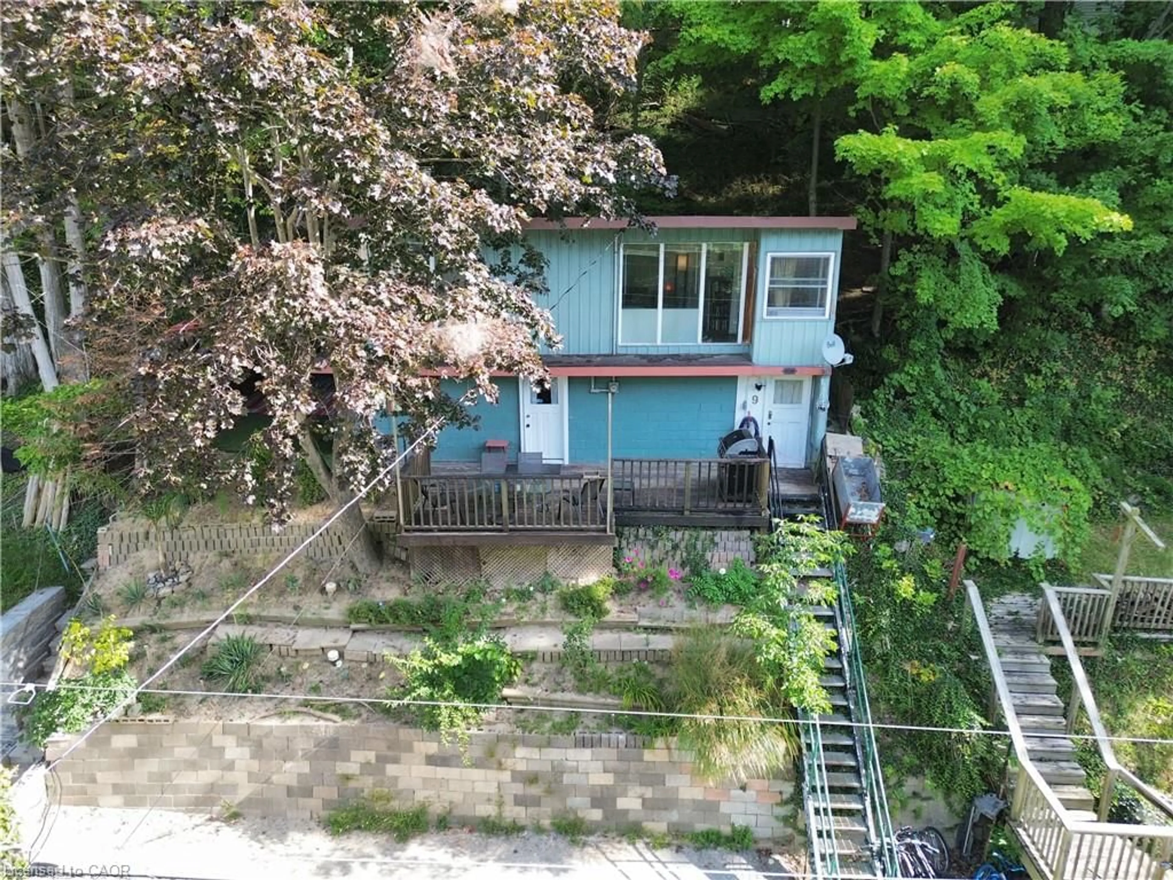 A pic from outside/outdoor area/front of a property/back of a property/a pic from drone, street for 9 C Lane, Fishers Glen Ontario N0E 1W0